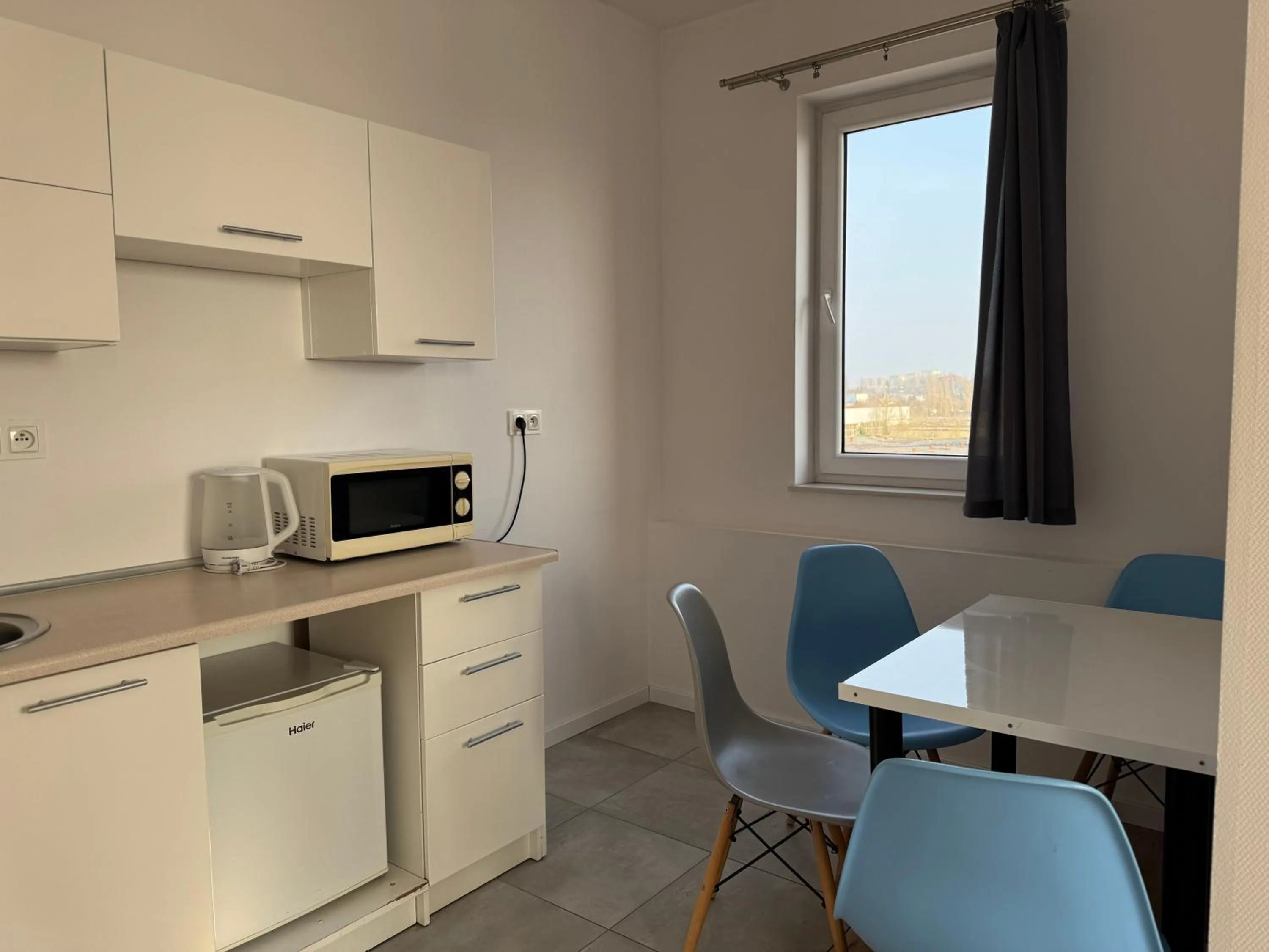 Kitchen or kitchenette in VESTA Apartamenty P23