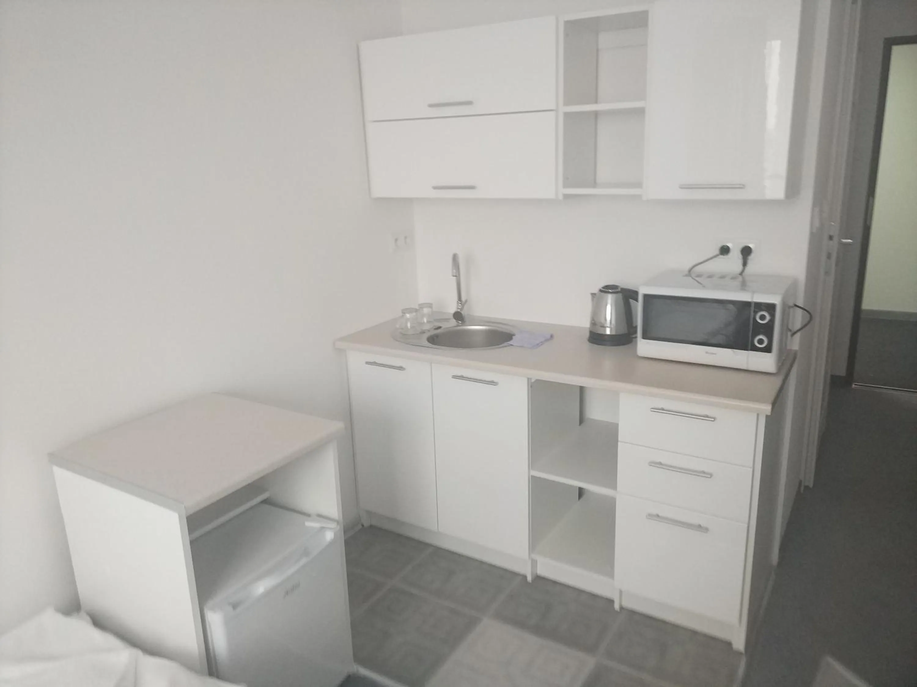 Kitchen or kitchenette in VESTA Apartamenty P23