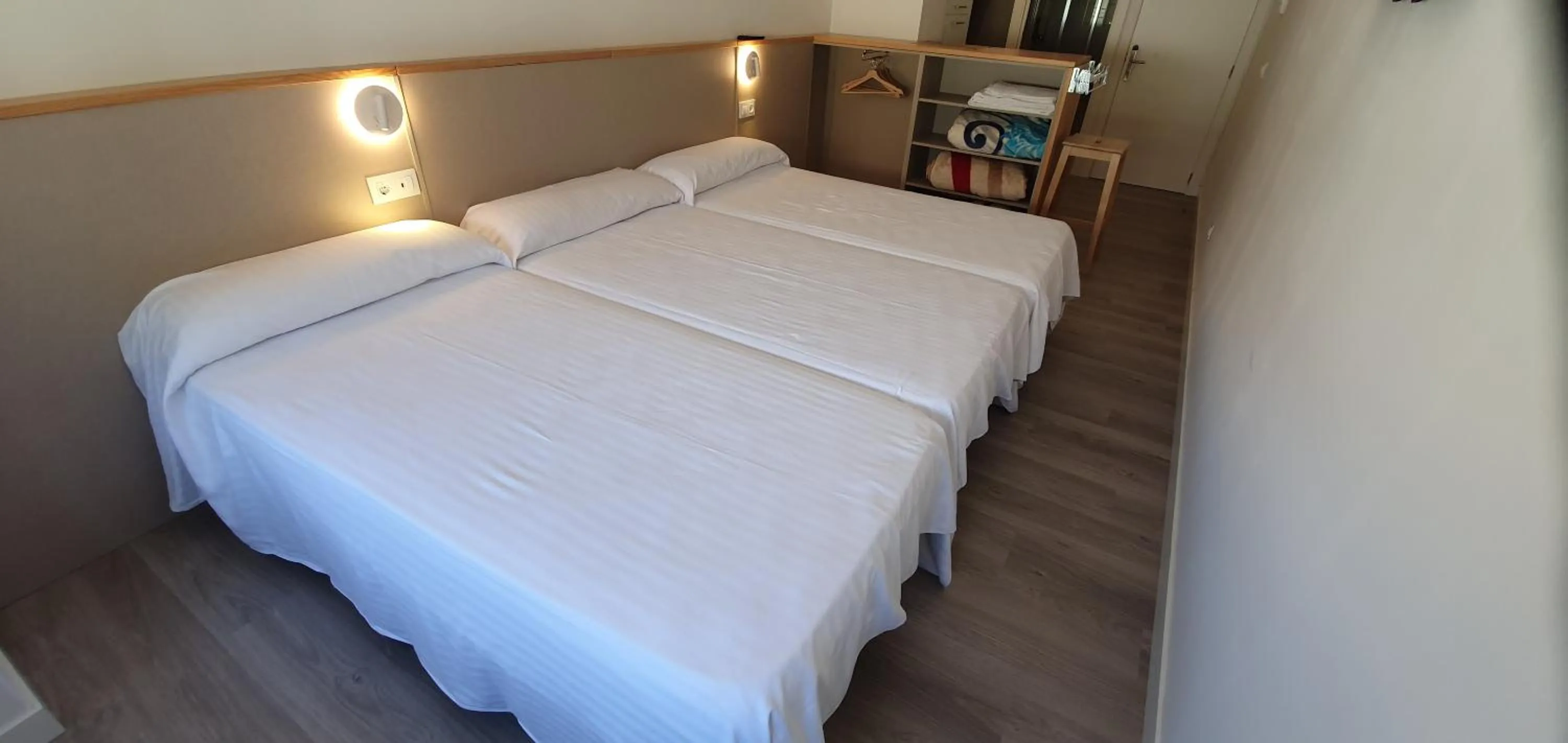 Bed in Apartamentos Costa da Morte Muxia