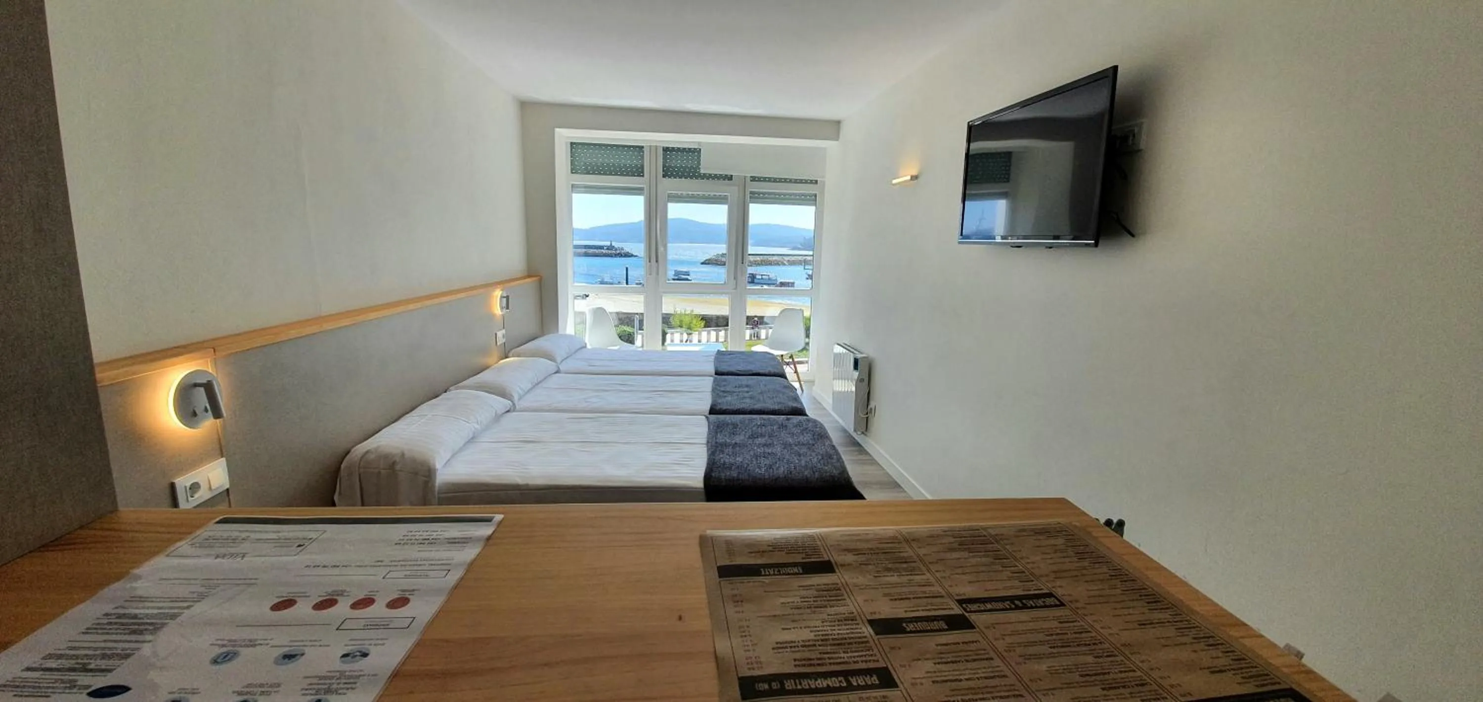 Bed in Apartamentos Costa da Morte Muxia