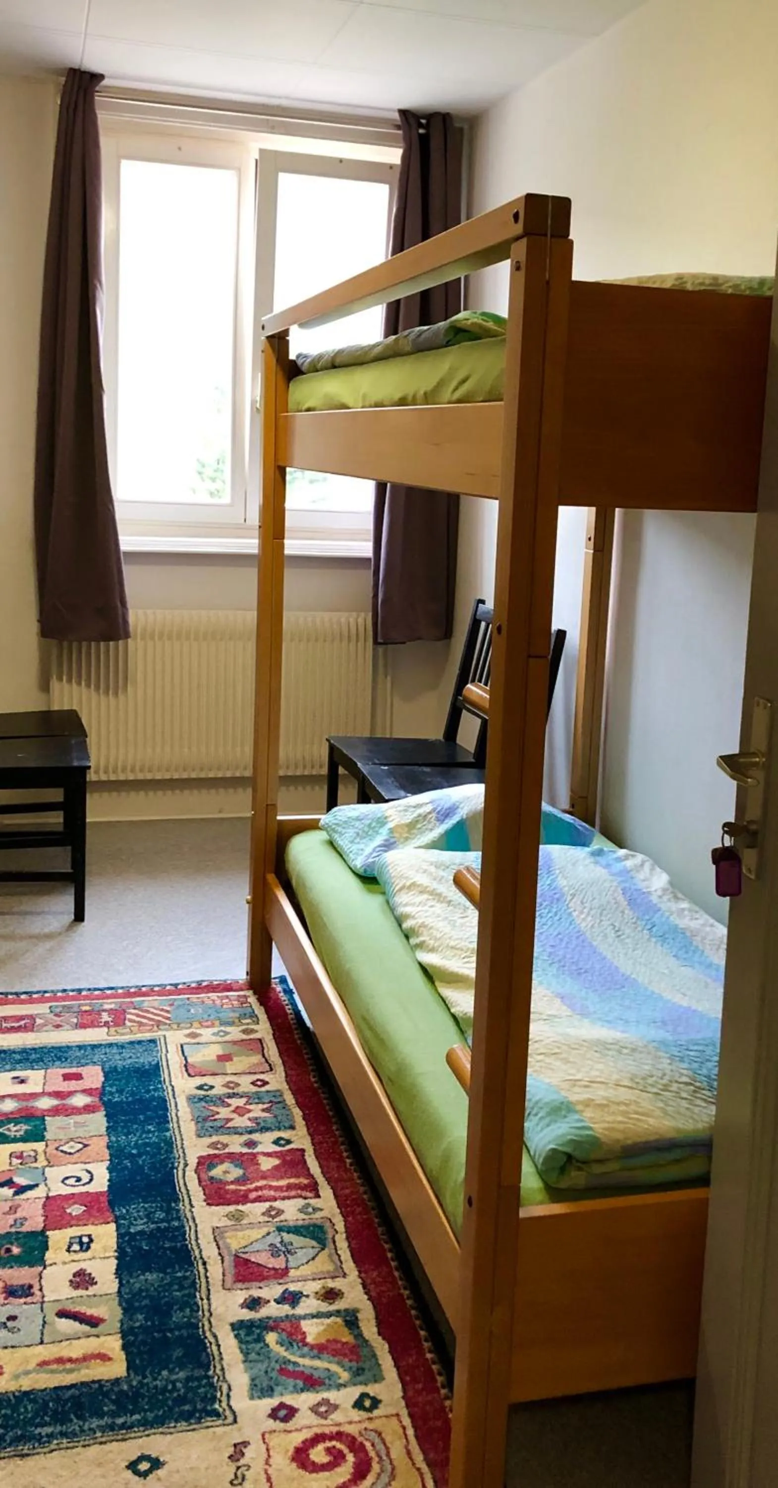 Bed in Auberge Pour Tous