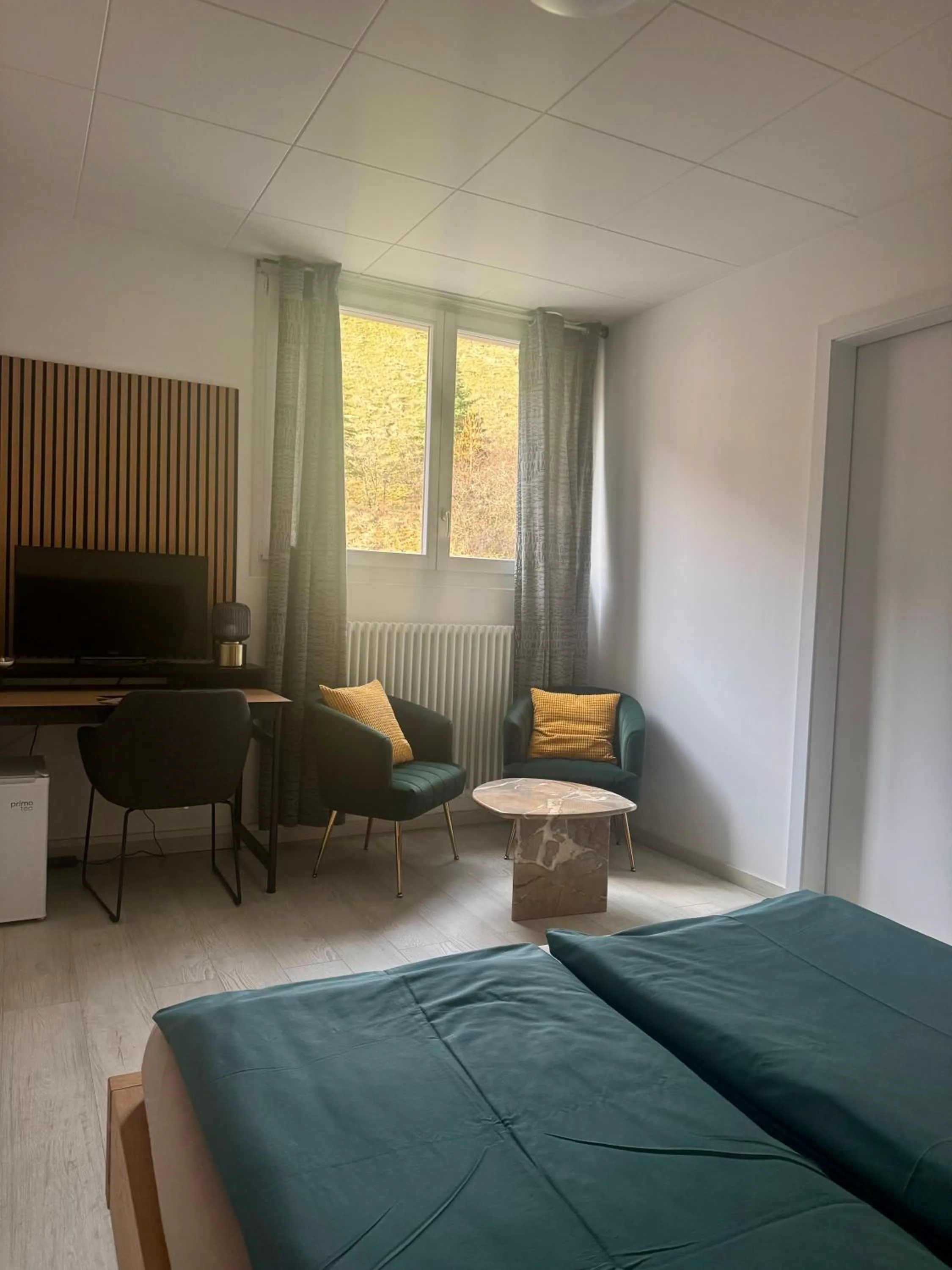 Bed in Auberge Pour Tous