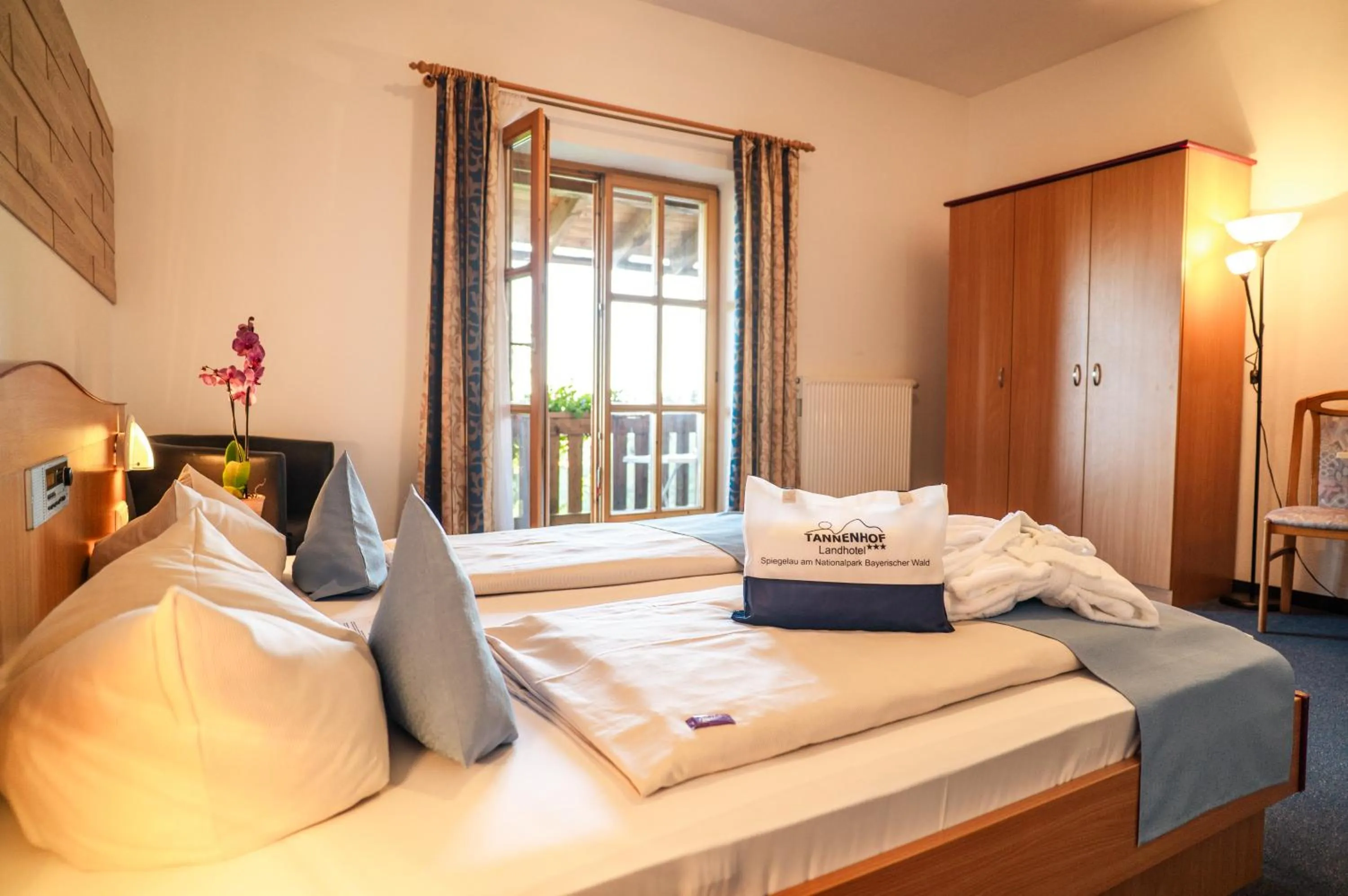 Photo of the whole room, Bed in Landhotel Tannenhof