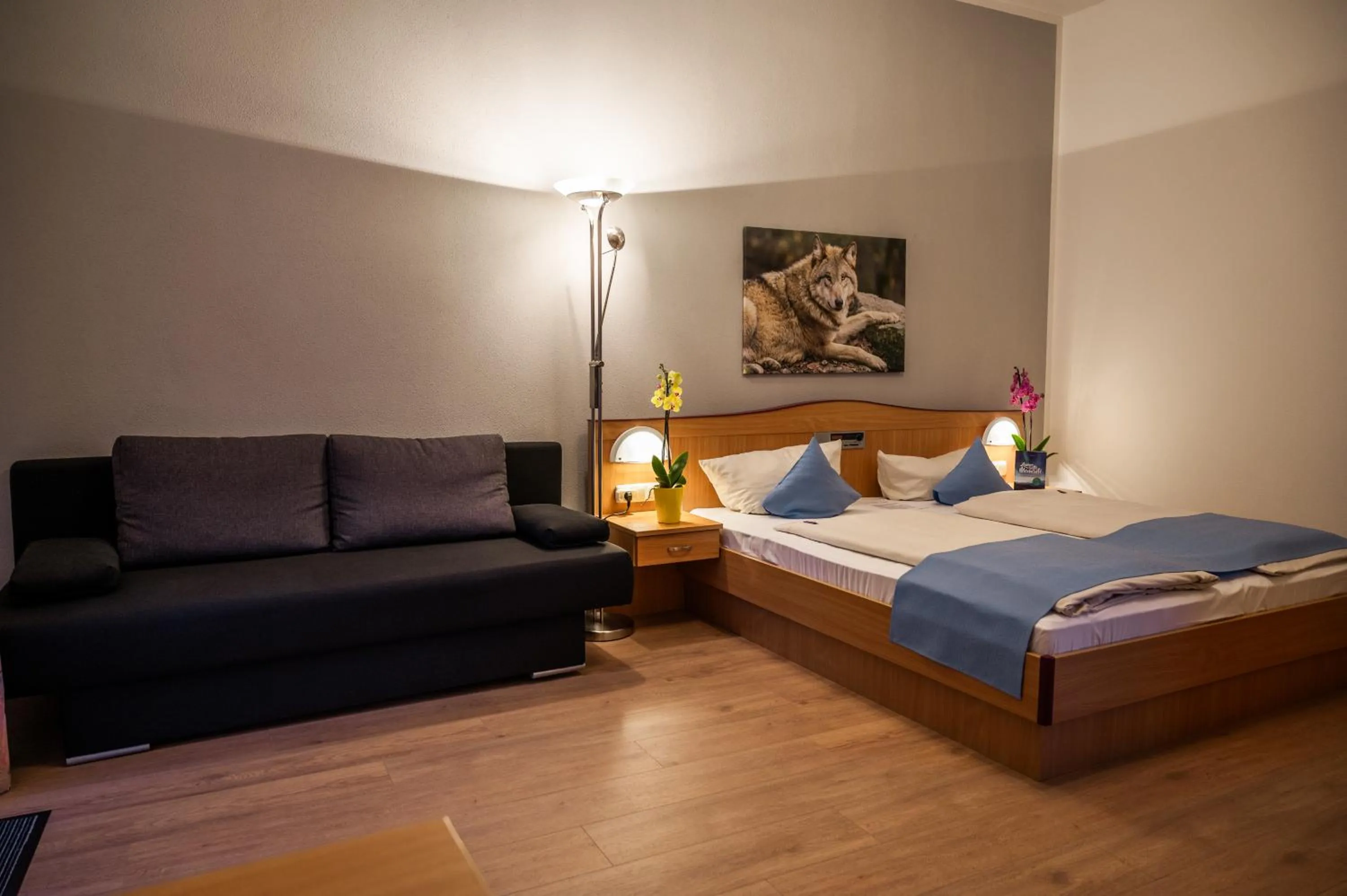 Living room, Bed in Landhotel Tannenhof