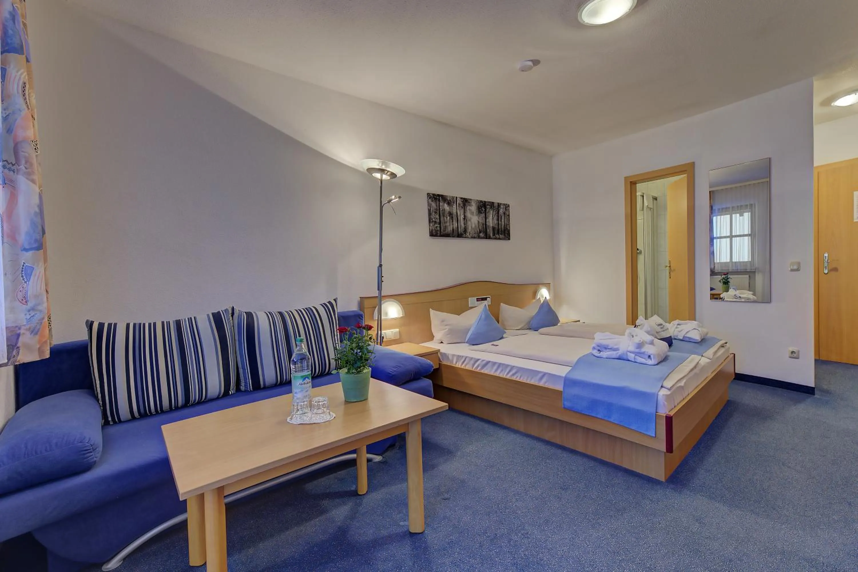 Living room, Bed in Landhotel Tannenhof