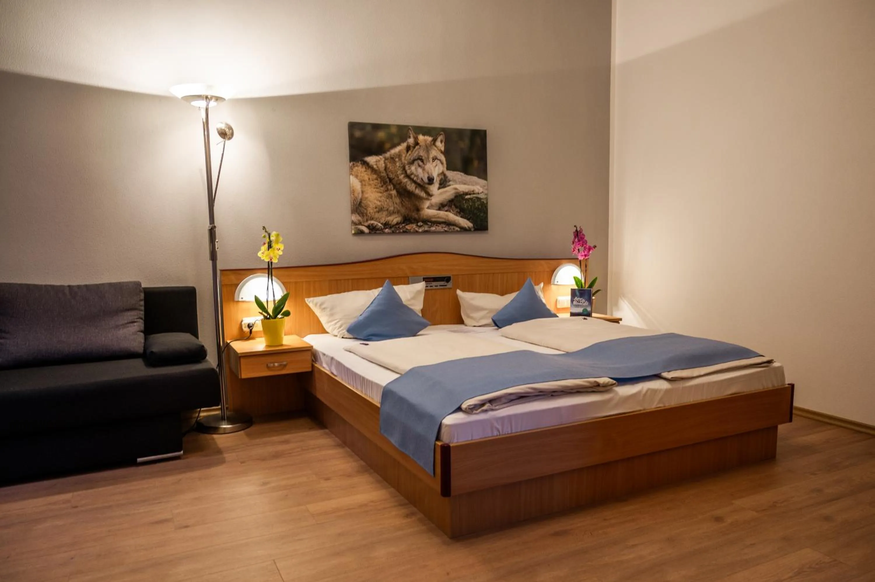 Living room, Bed in Landhotel Tannenhof