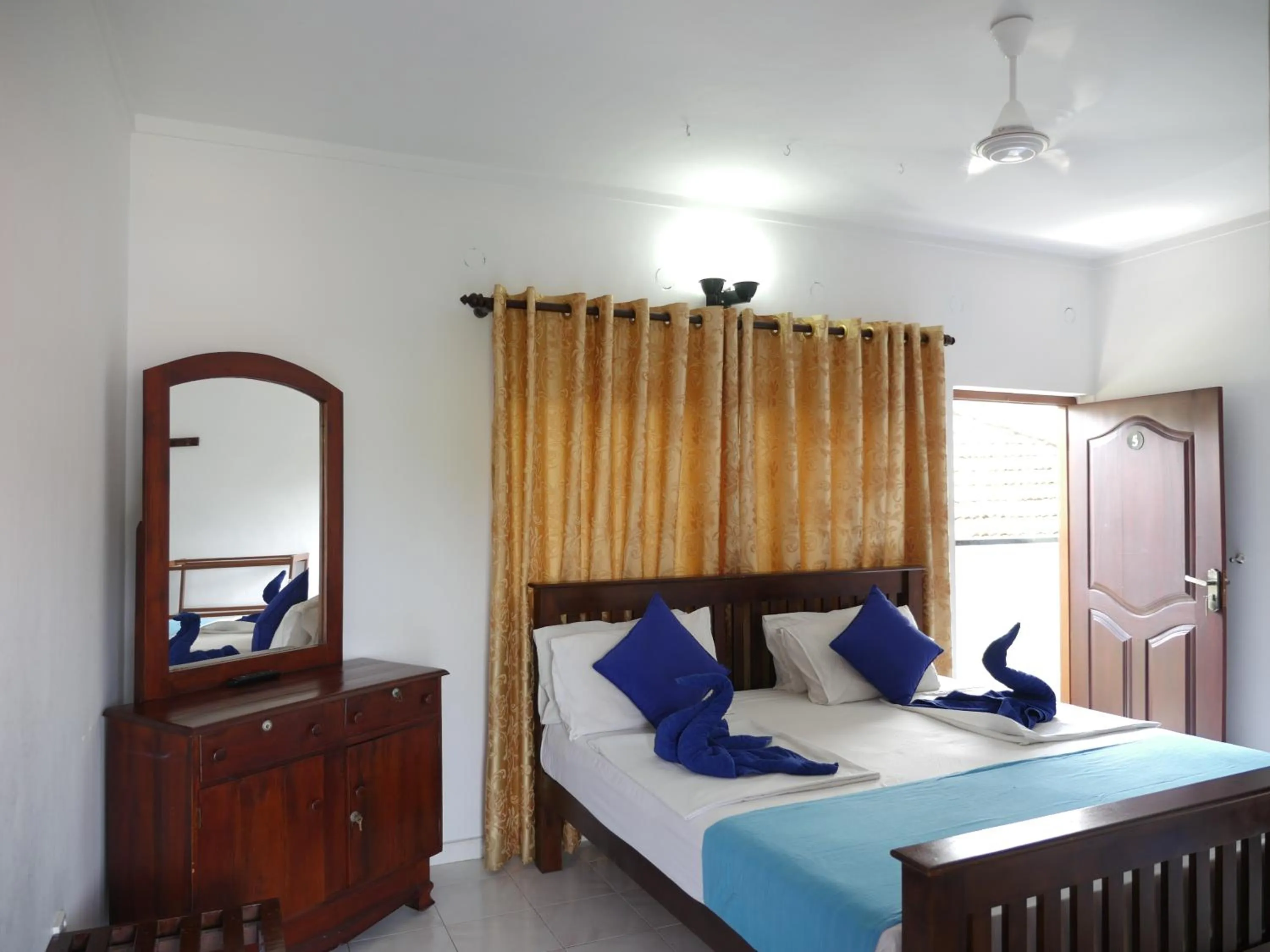 Photo of the whole room, Bed in Ocean View tourist guest house at Negombo beach near the airport