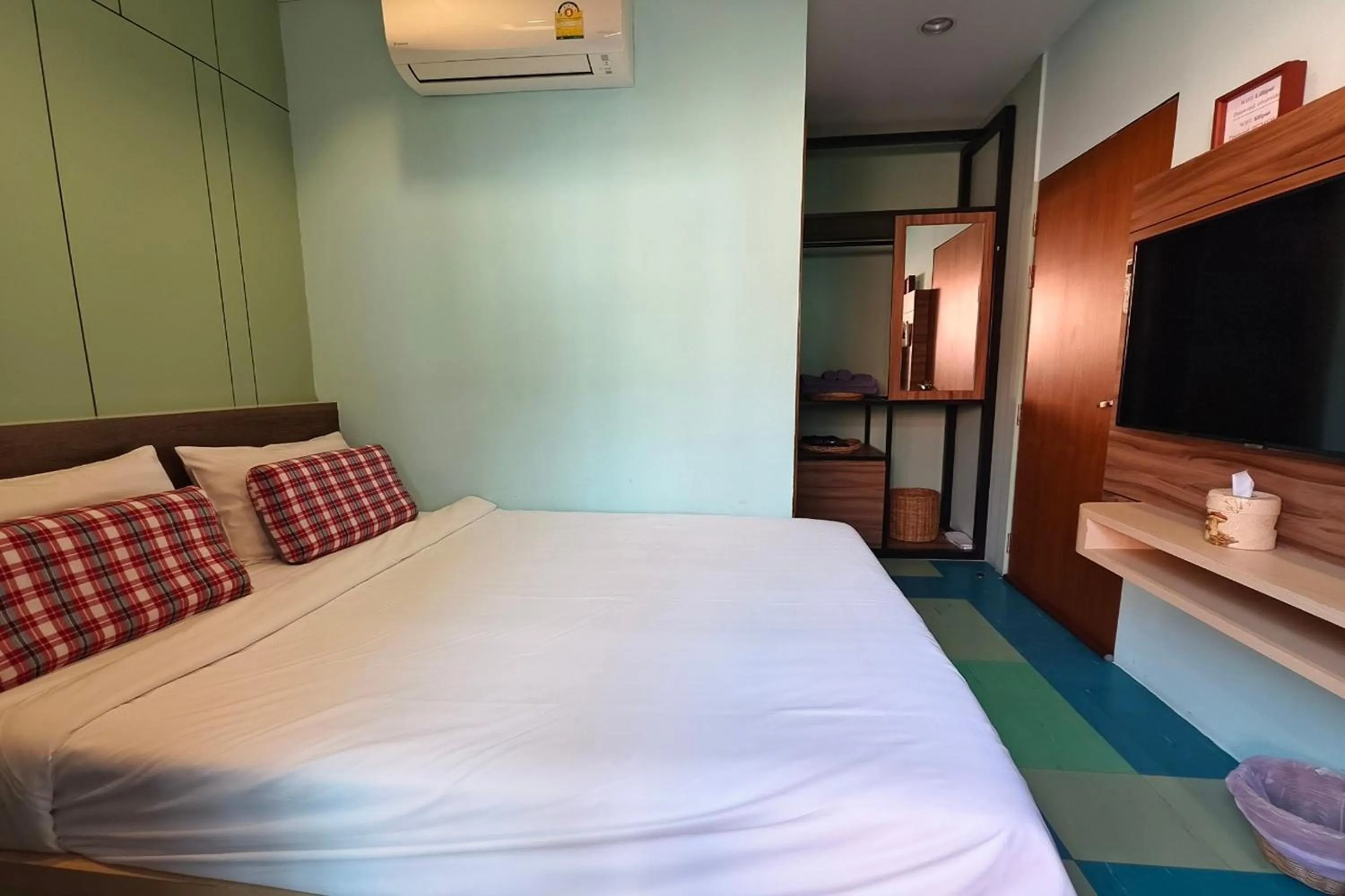 Bed in Lilliput Riverside Bangkachao