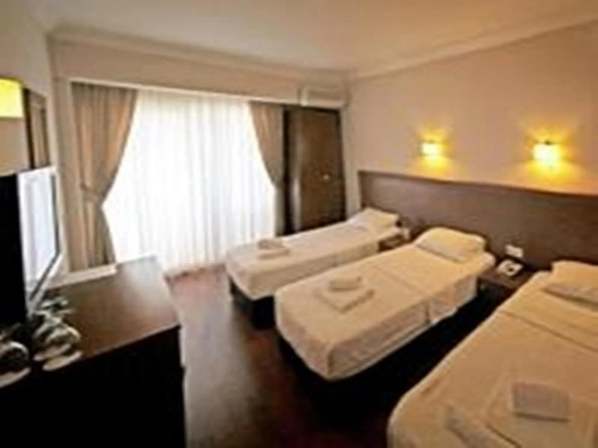 Bed in Ucem Hotel Golden Sea