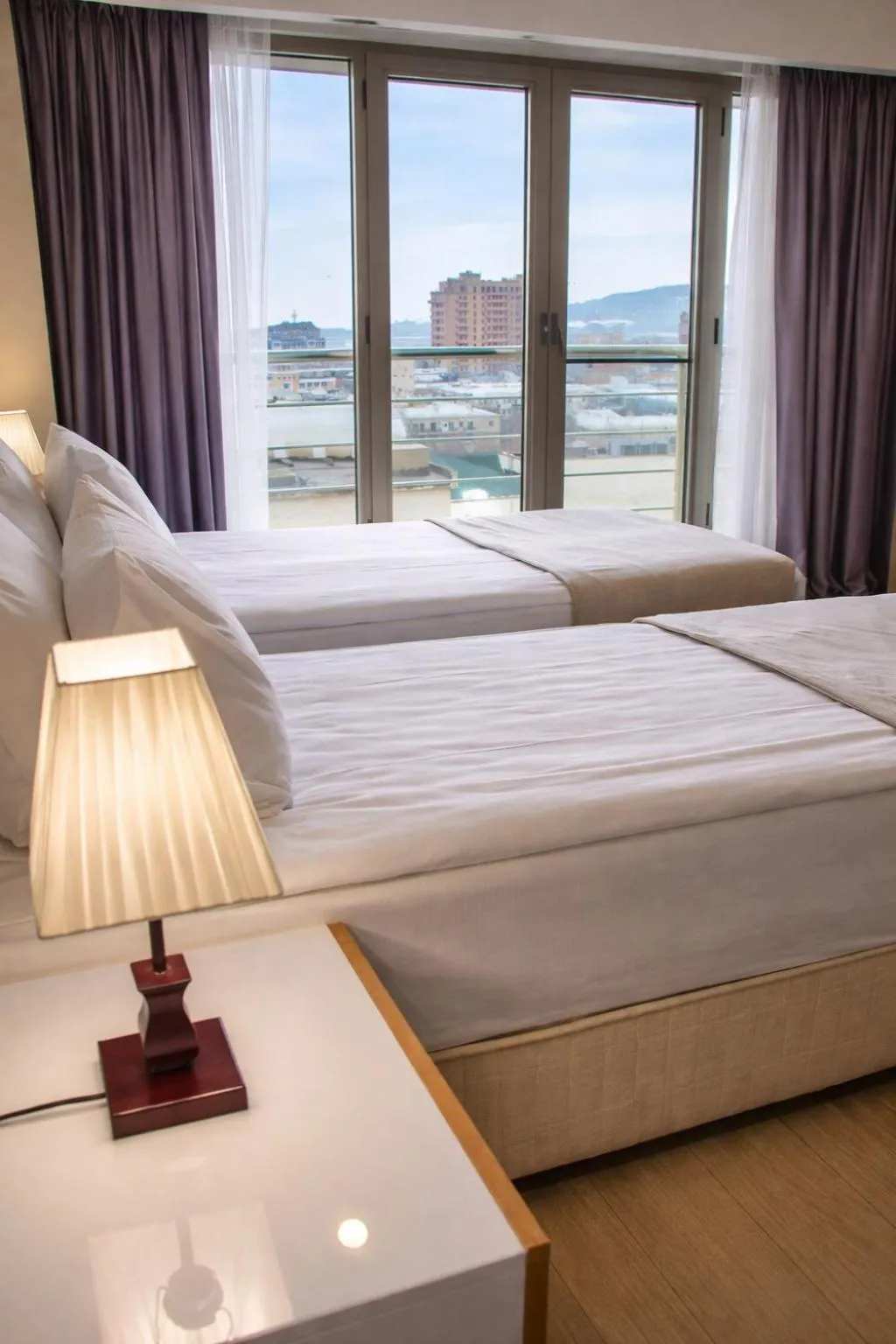 Bed in Diplomat Suites Hotel