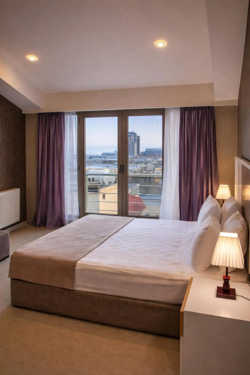 Bed in Diplomat Suites Hotel