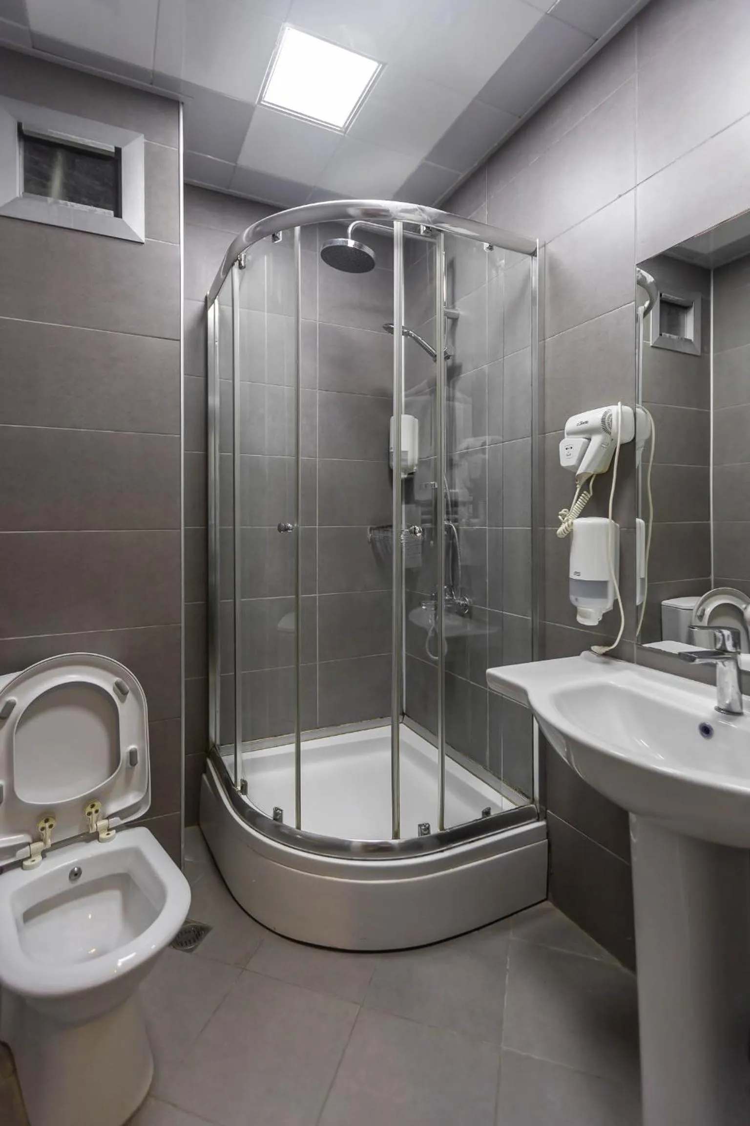 Toilet in Diplomat Suites Hotel