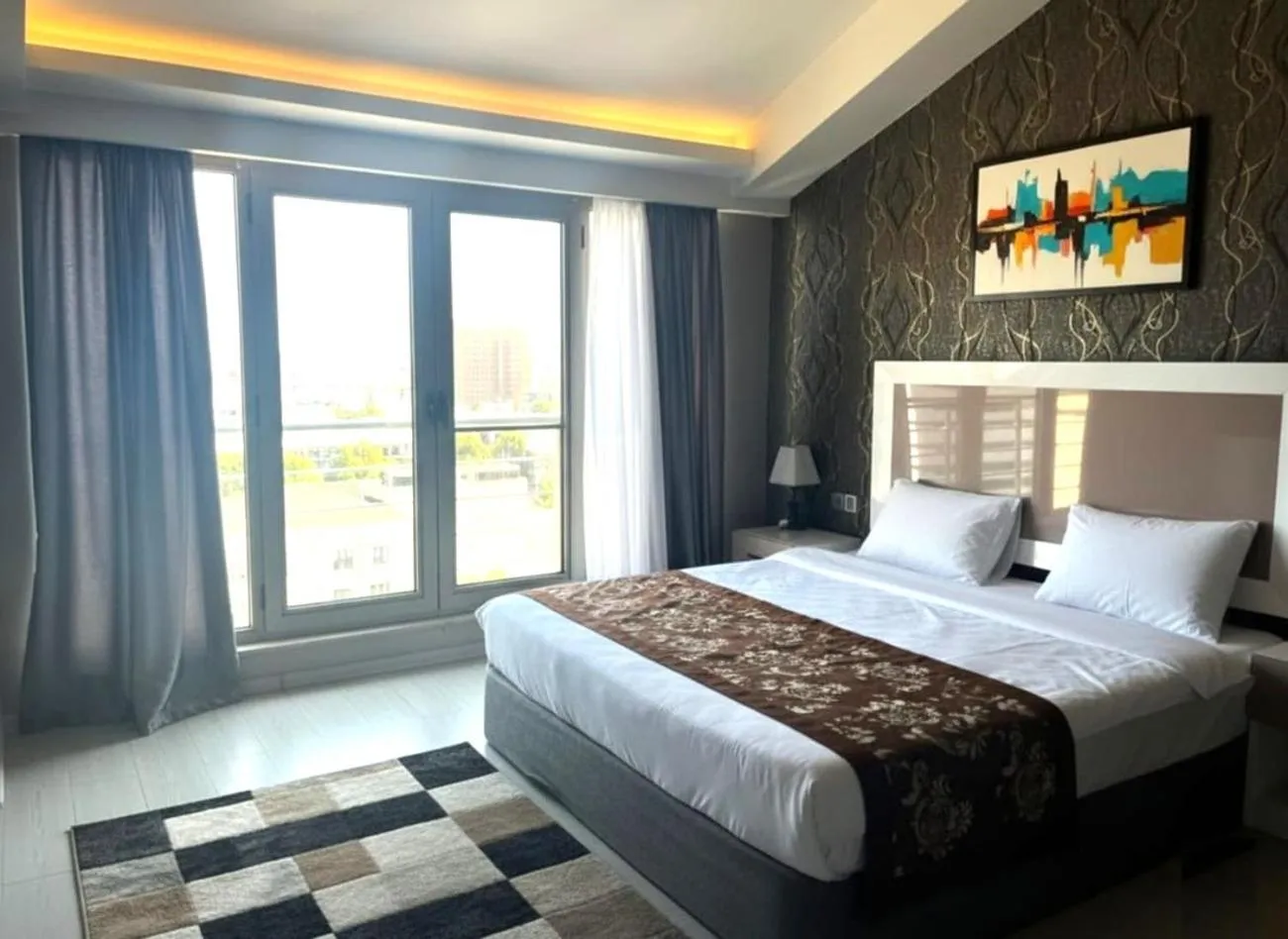 Photo of the whole room, Bed in Diplomat Suites Hotel