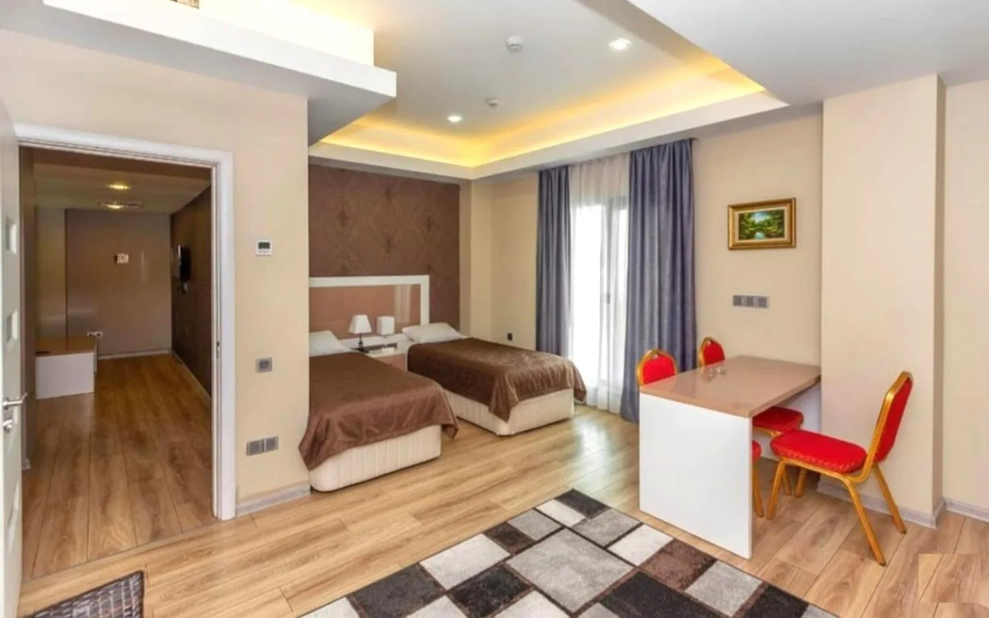 Bed in Diplomat Suites Hotel