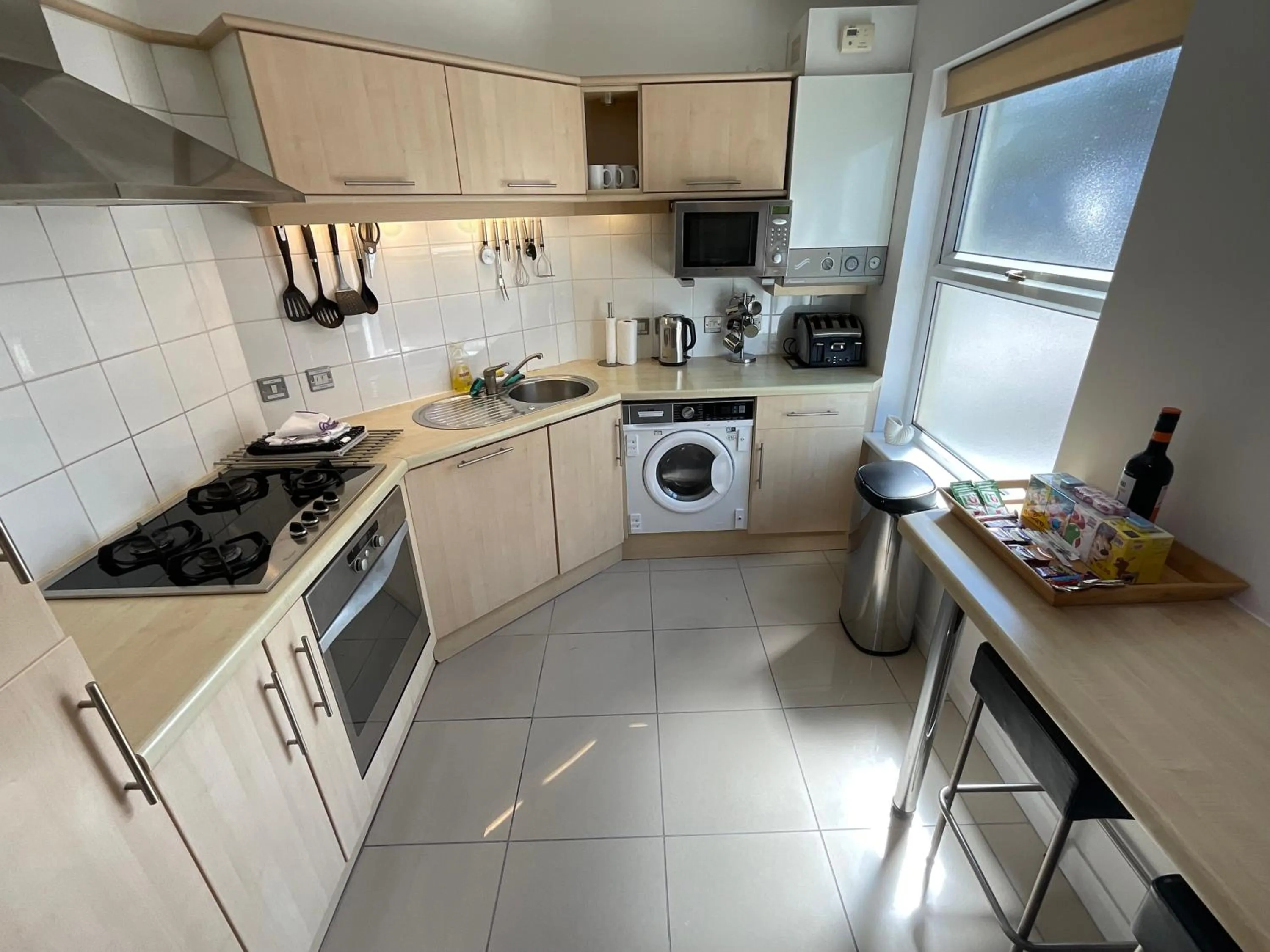 dishwasher in Earle House Serviced Apartments