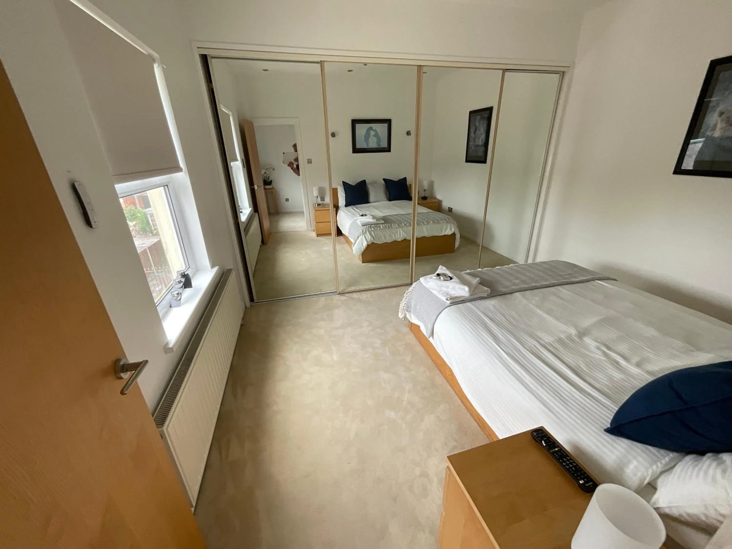 wardrobe, Bed in Earle House Serviced Apartments