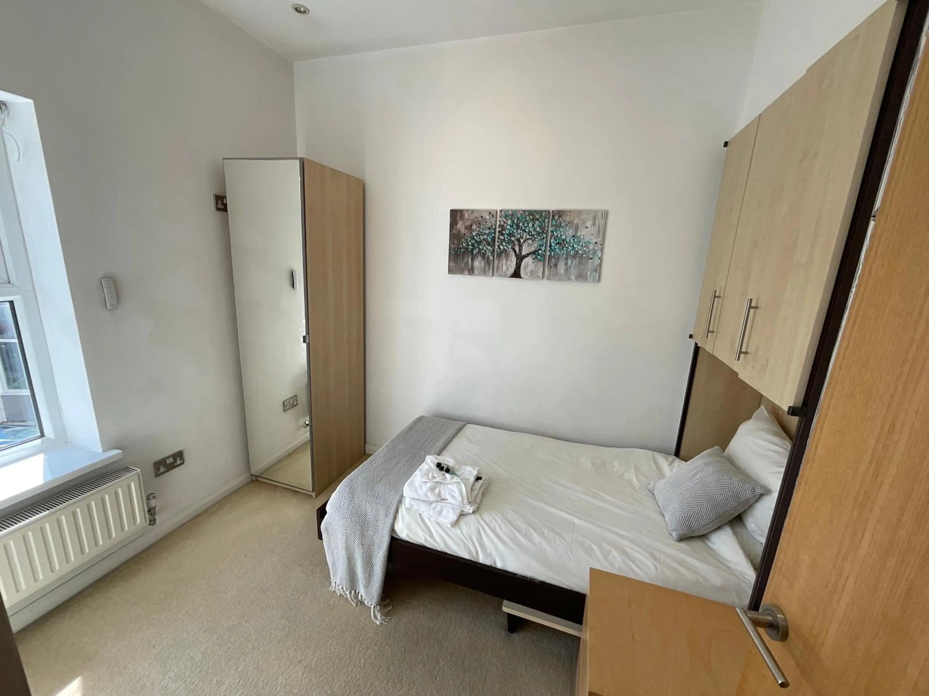 Bed in Earle House Serviced Apartments