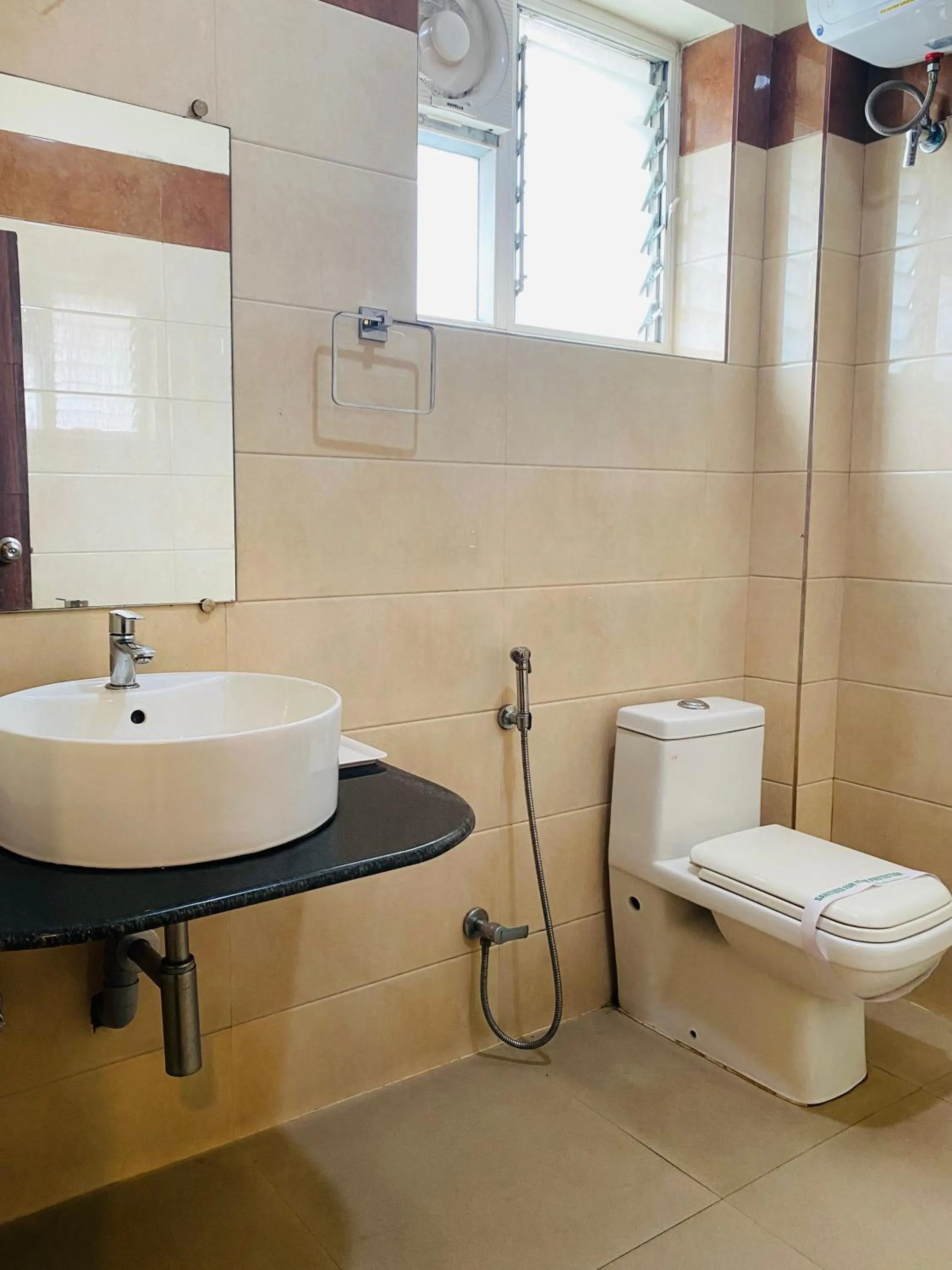Bathroom in Hotel Saayein Residency
