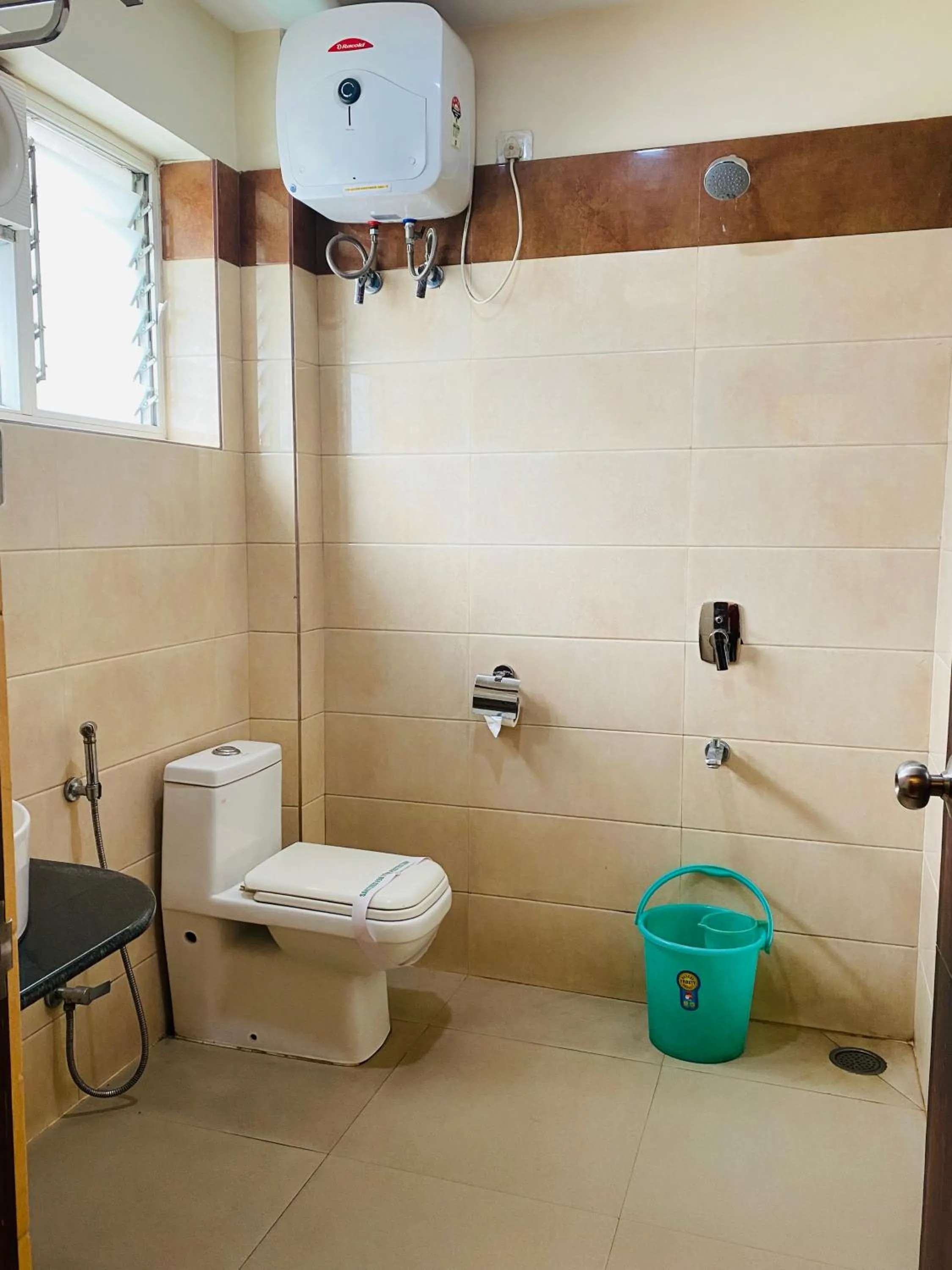 Bathroom in Hotel Saayein Residency
