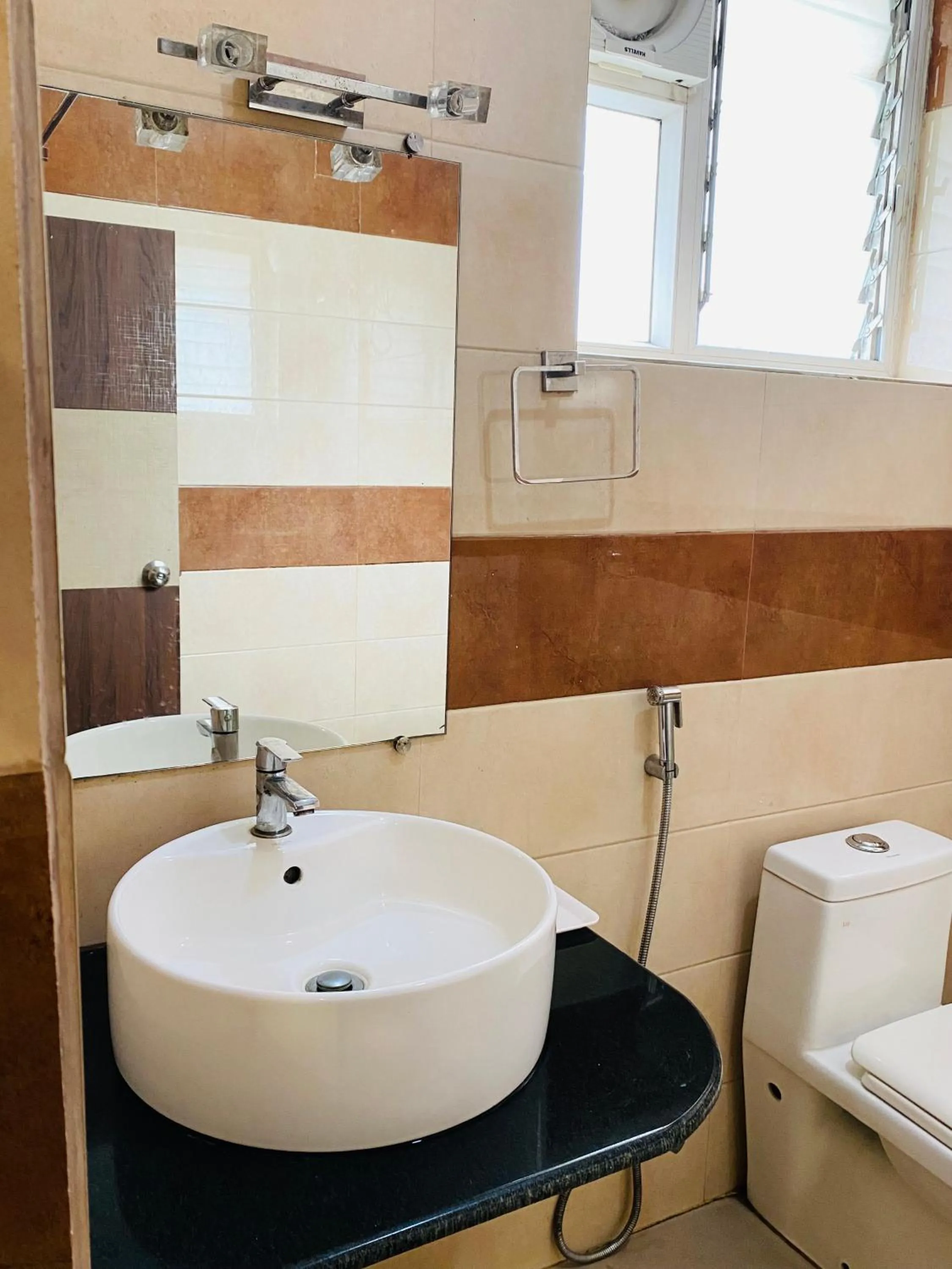 Bathroom in Hotel Saayein Residency