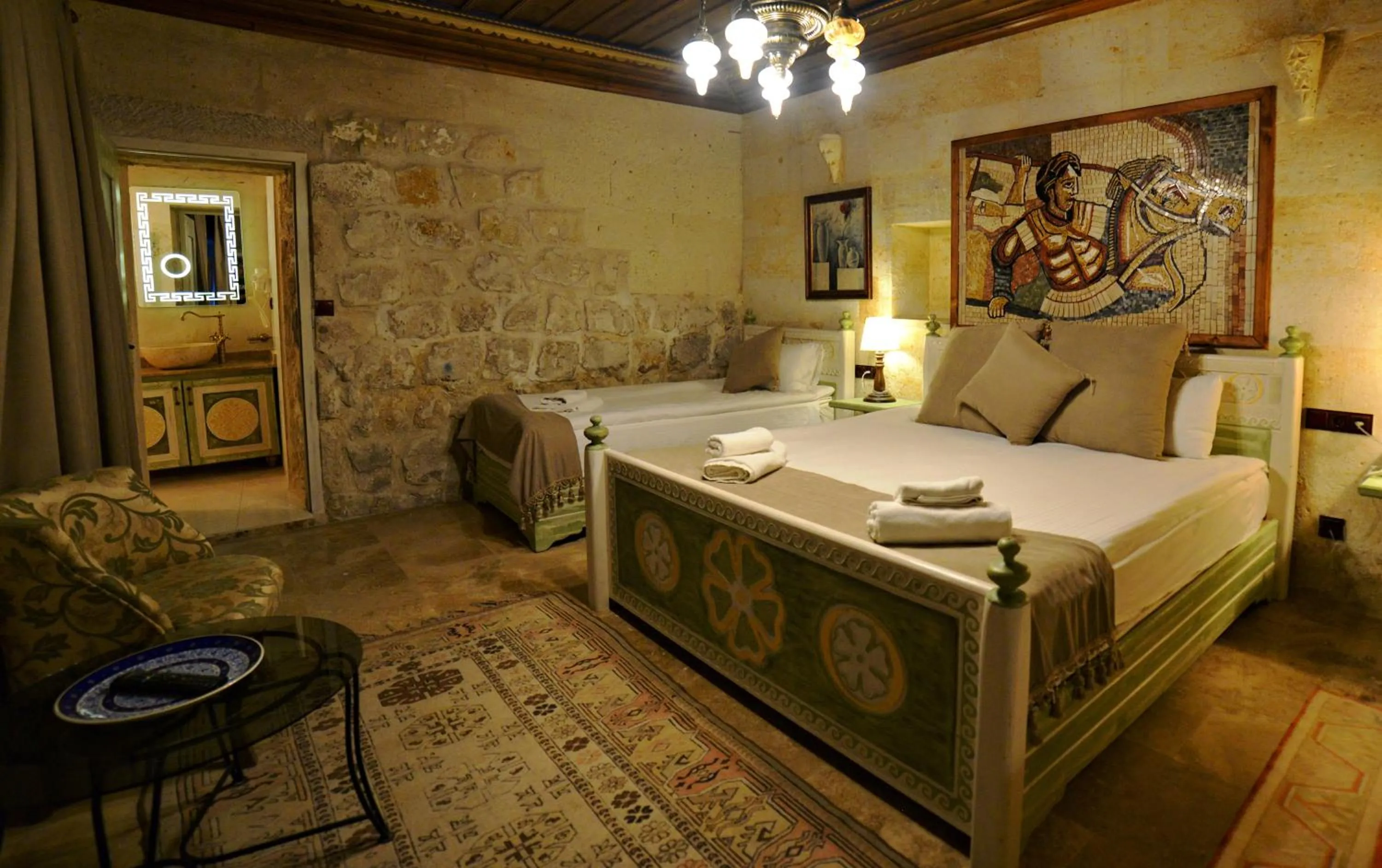 Bedroom, Bed in Caftan Cave Suites