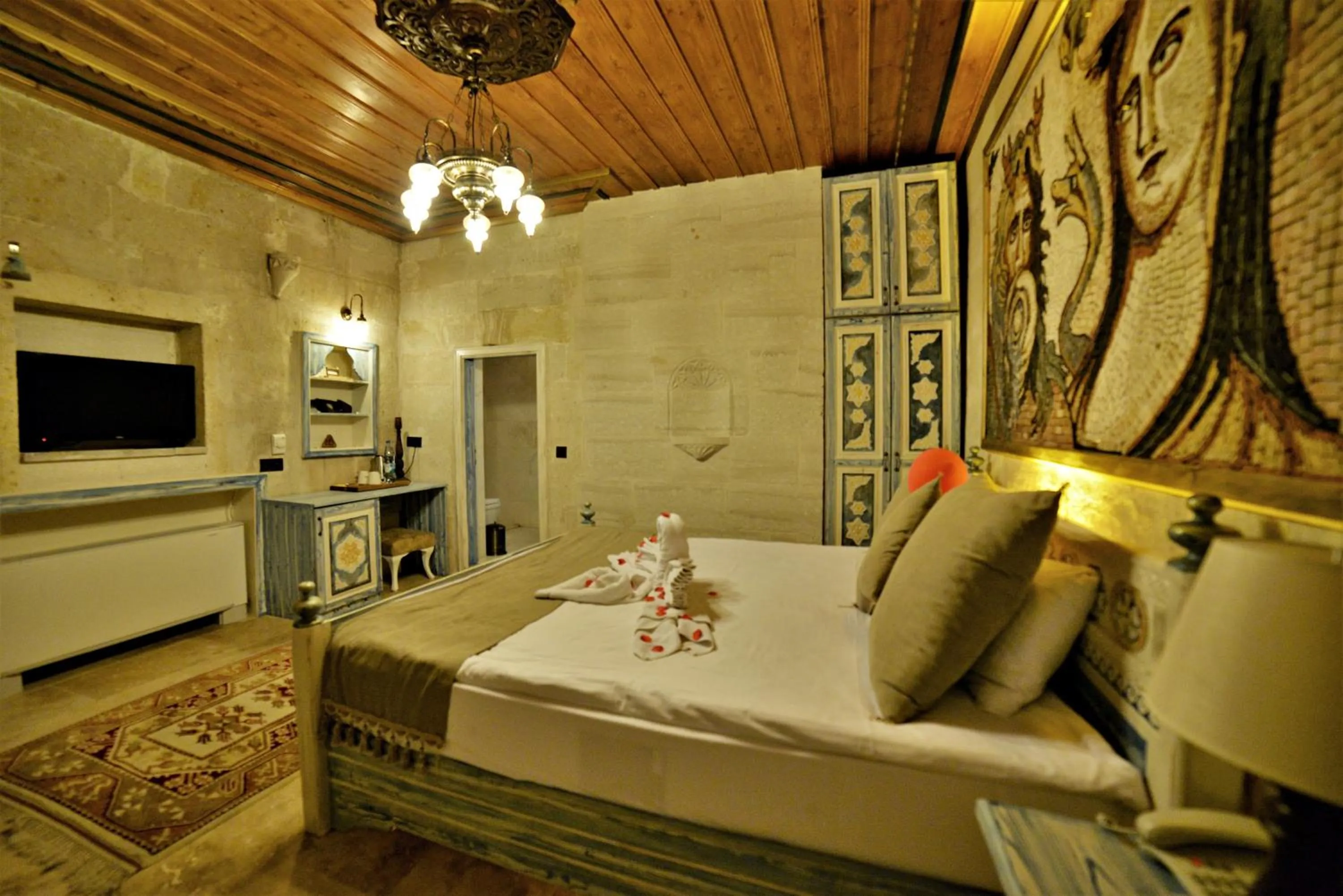 Bedroom, Bed in Caftan Cave Suites