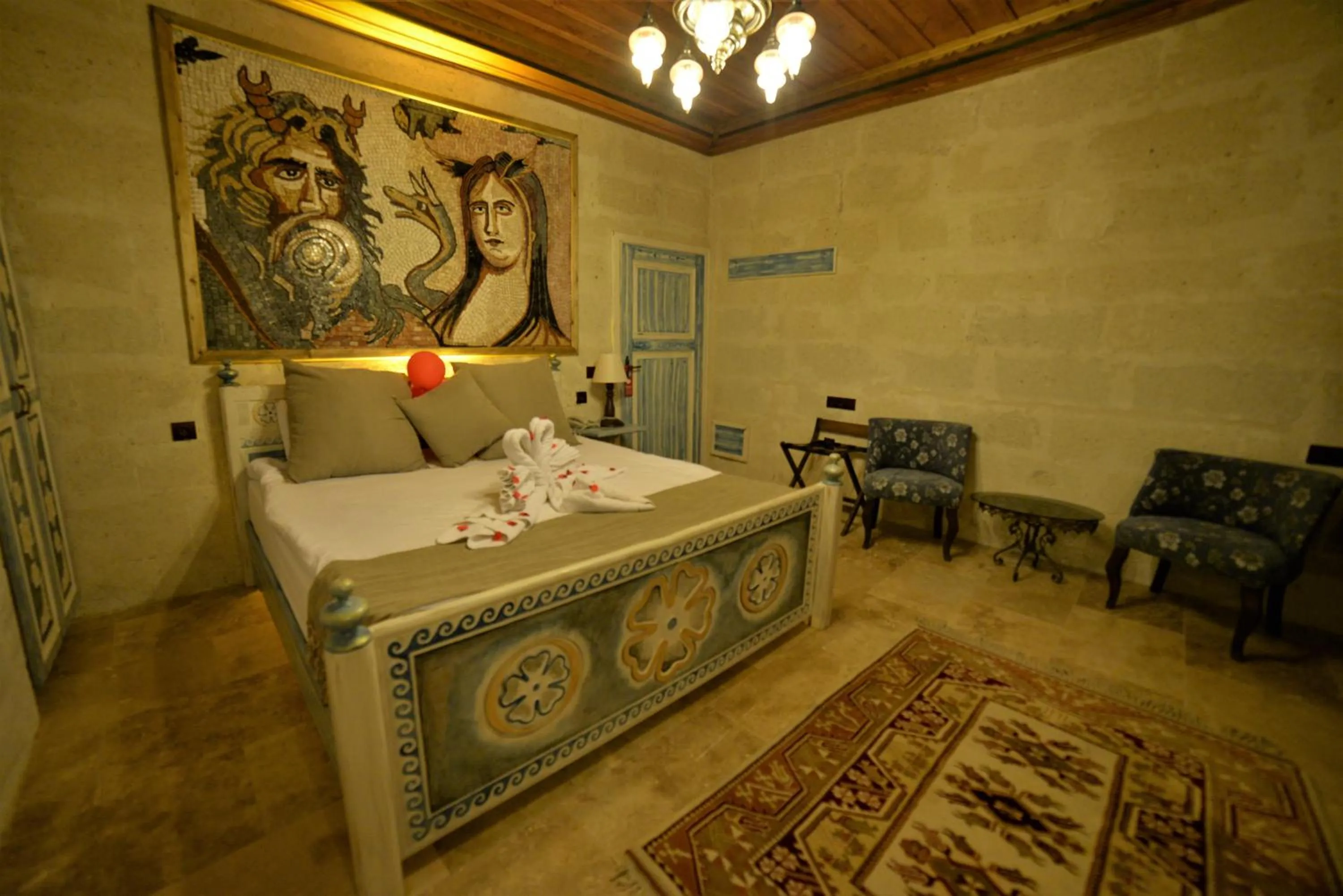 Bedroom, Bed in Caftan Cave Suites