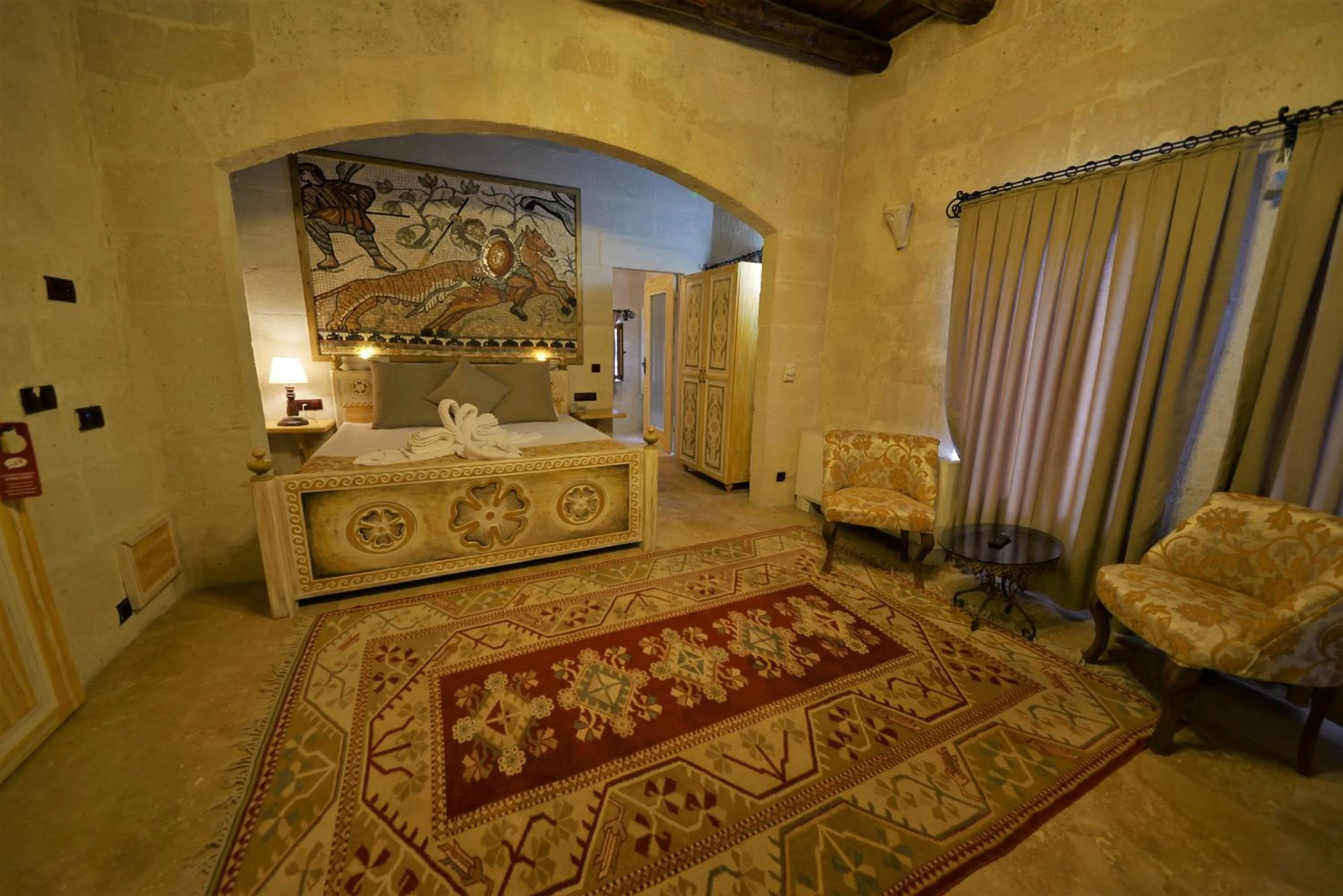 Bedroom, Bed in Caftan Cave Suites