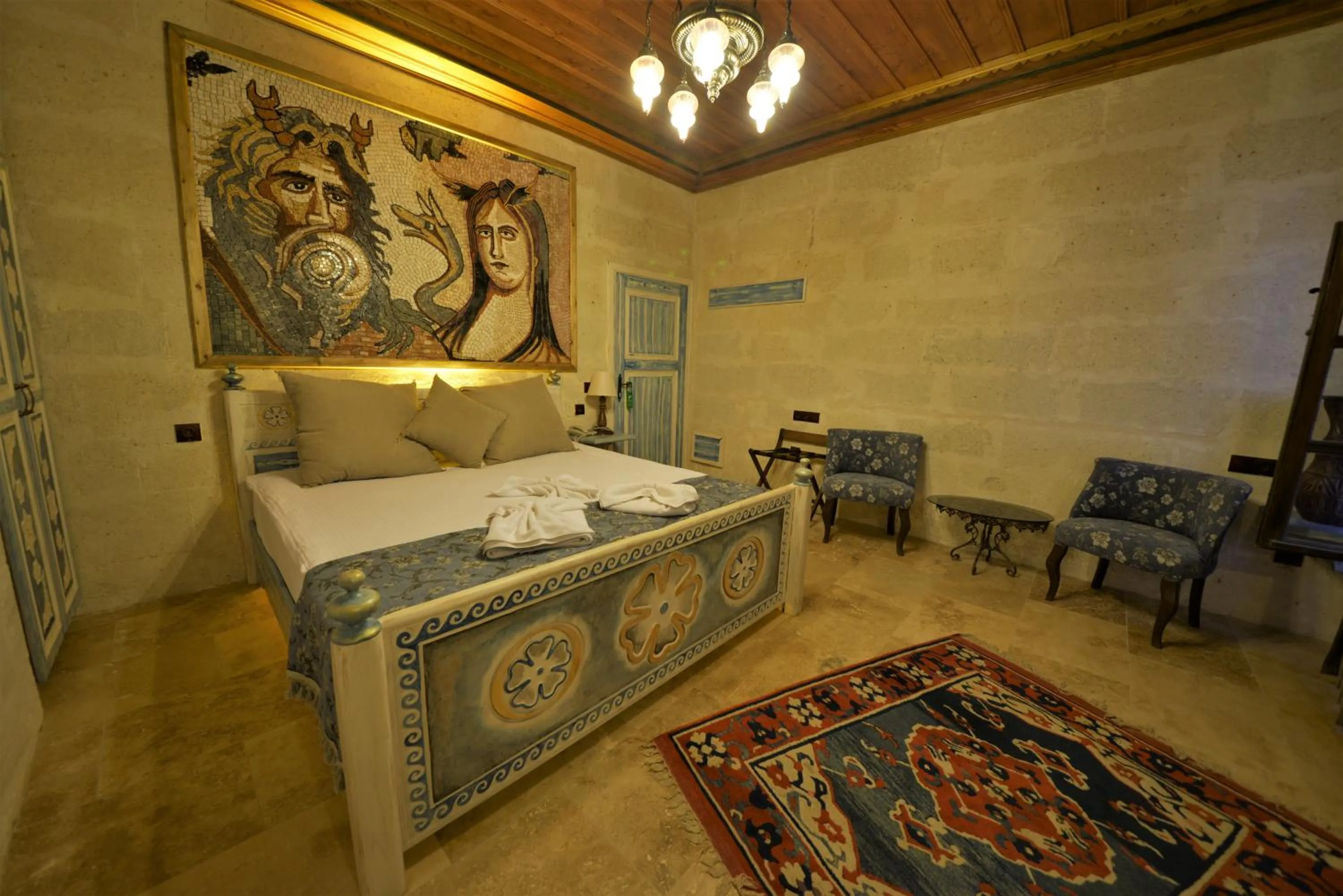 Bedroom, Bed in Caftan Cave Suites