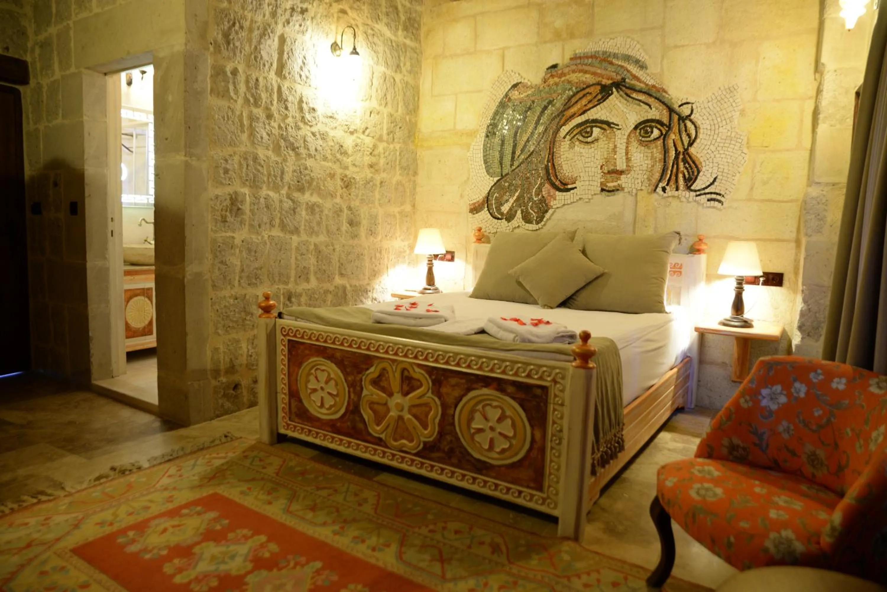 Bedroom, Bed in Caftan Cave Suites