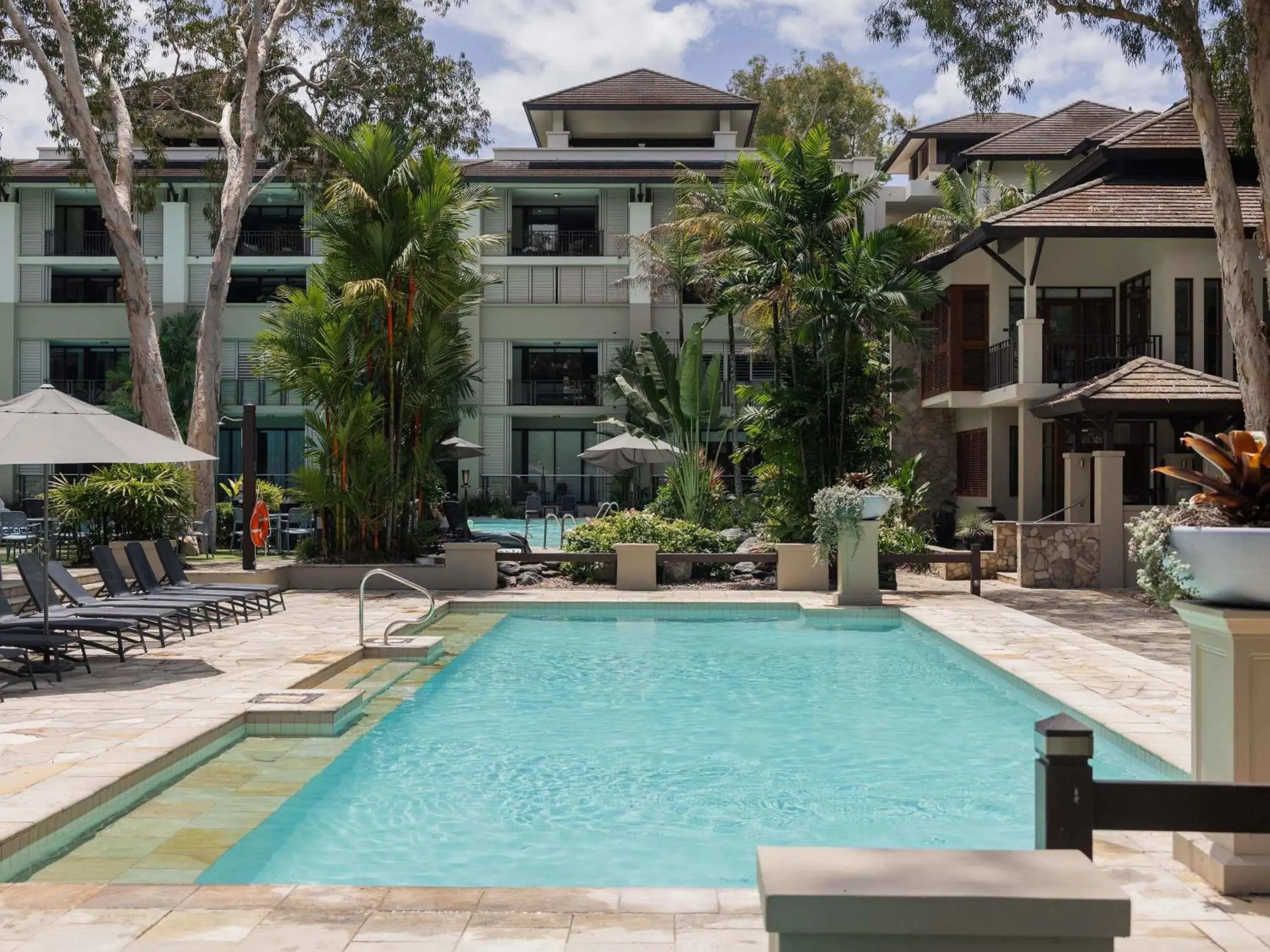 Property building in Pullman Palm Cove Sea Temple Resort & Spa Property building in Pullman Palm Cove Sea Temple Resort & Spa