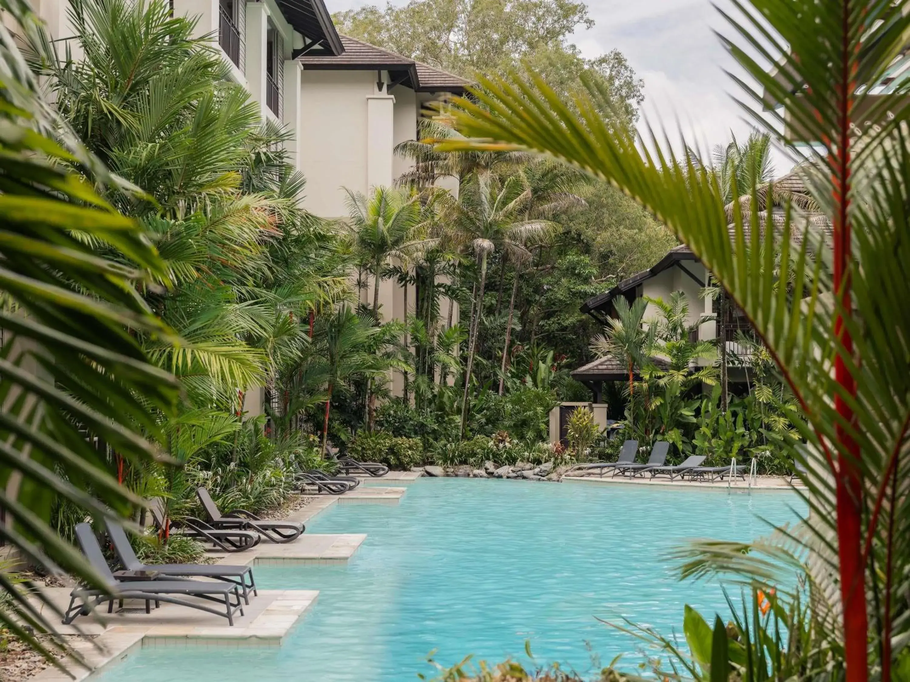 Property building in Pullman Palm Cove Sea Temple Resort & Spa Property building in Pullman Palm Cove Sea Temple Resort & Spa