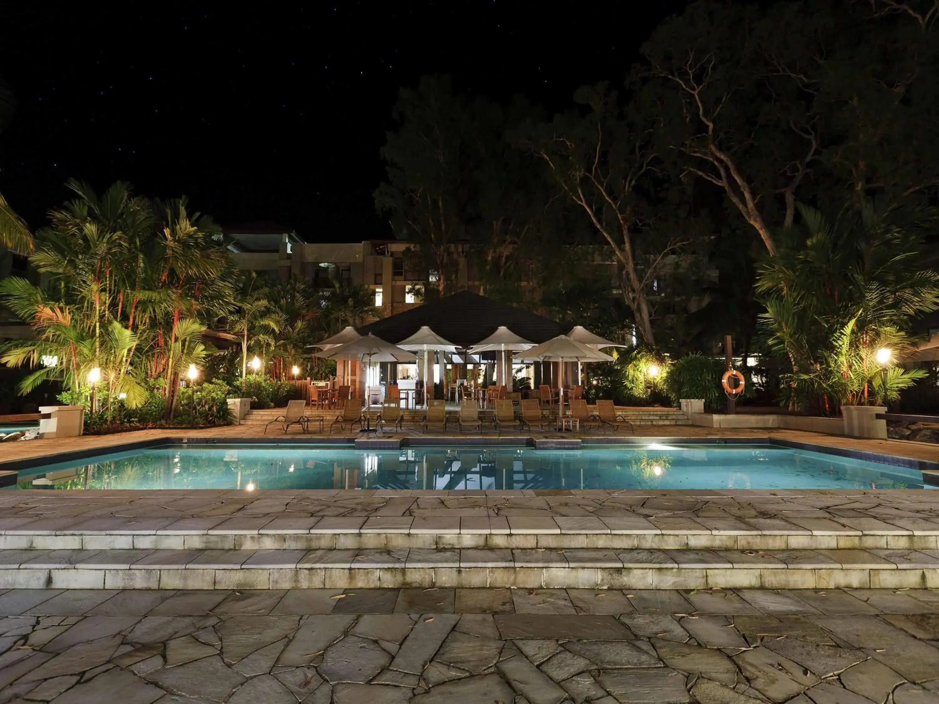 Pool view in Pullman Palm Cove Sea Temple Resort & Spa Pool view in Pullman Palm Cove Sea Temple Resort & Spa