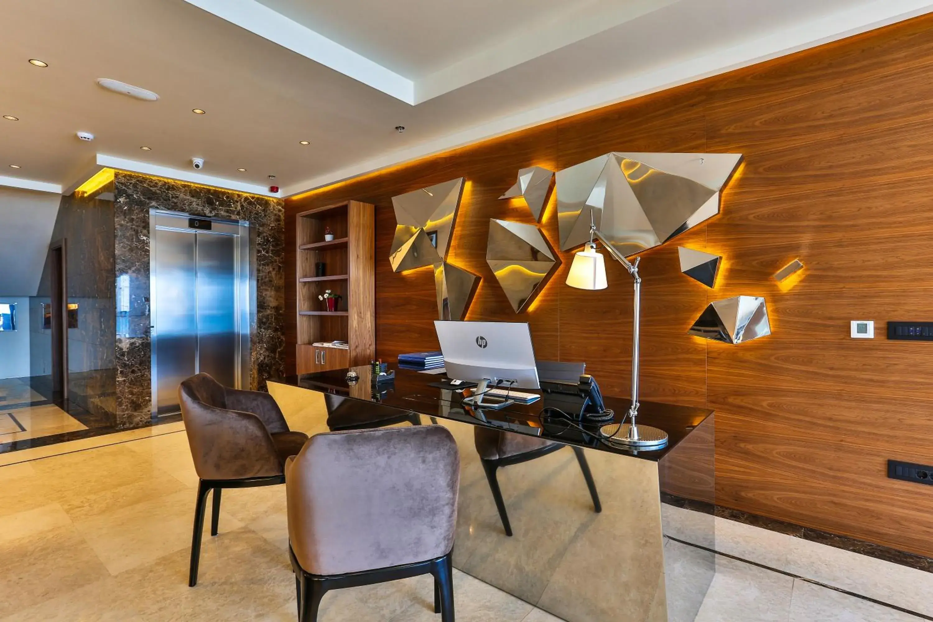 Lobby or reception in Hotel California by Aycon Lobby or reception in Hotel California by Aycon