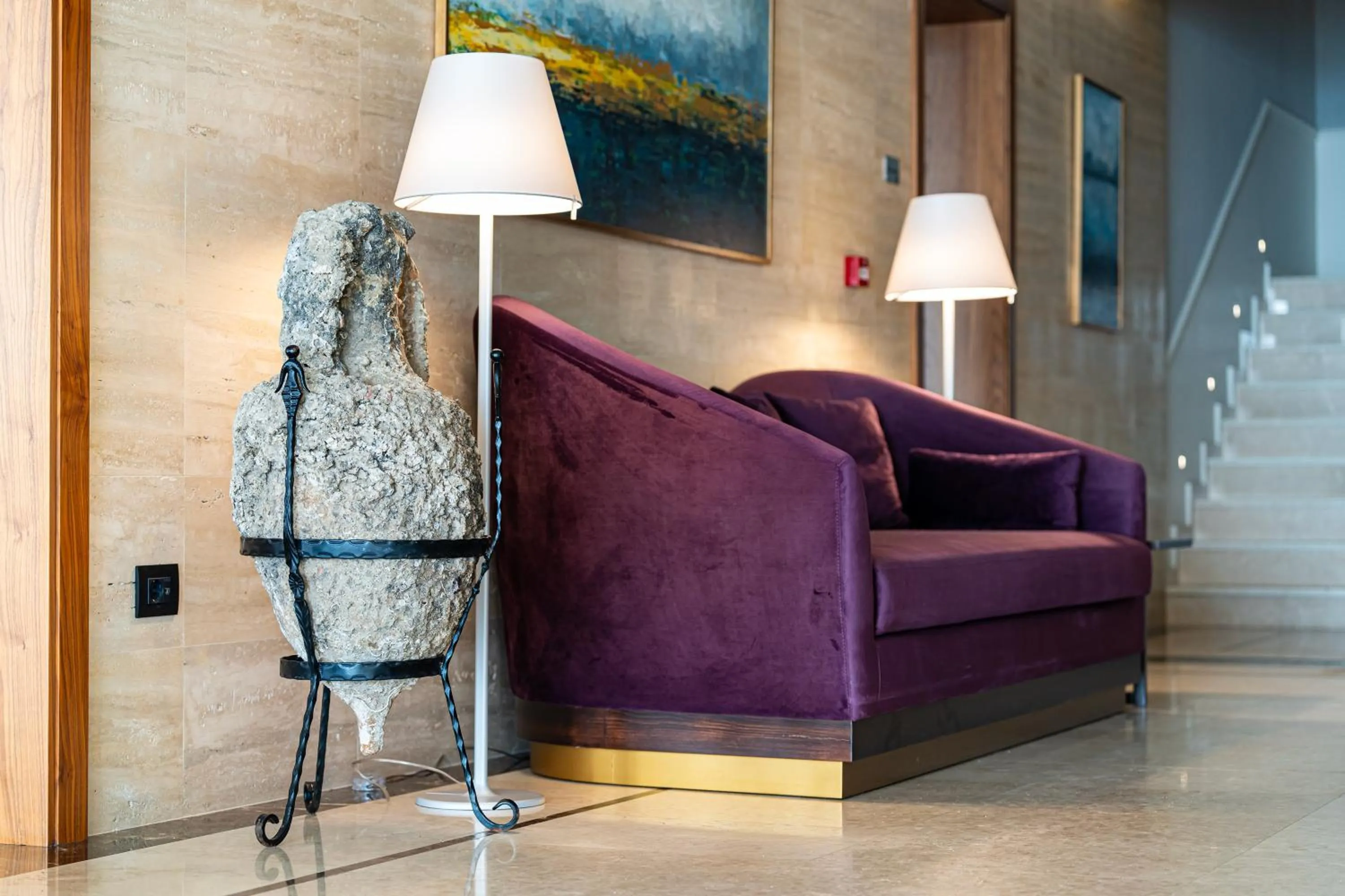 Seating area in Hotel California by Aycon