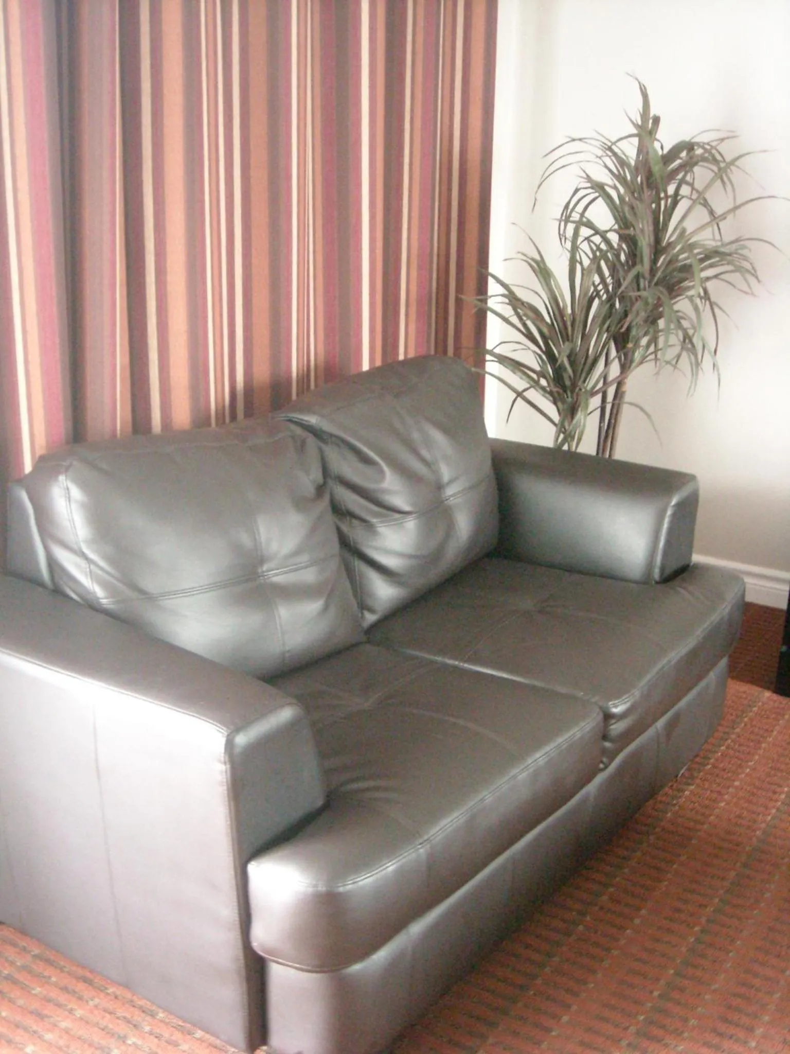 Seating area in Grand Motel Saint-Hubert