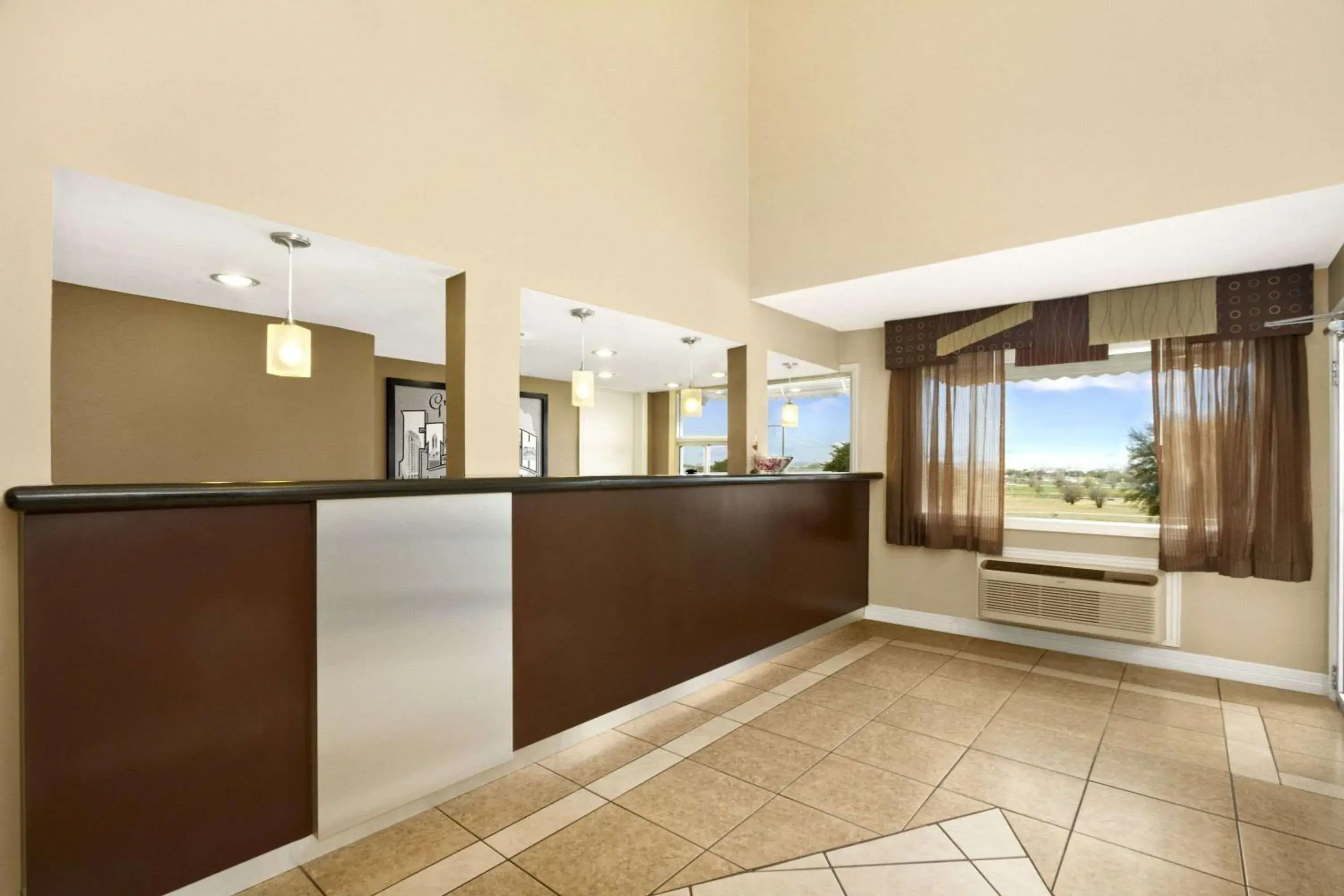 Lobby or reception in Super 8 by Wyndham Fort Worth TX Lobby or reception in Super 8 by Wyndham Fort Worth TX