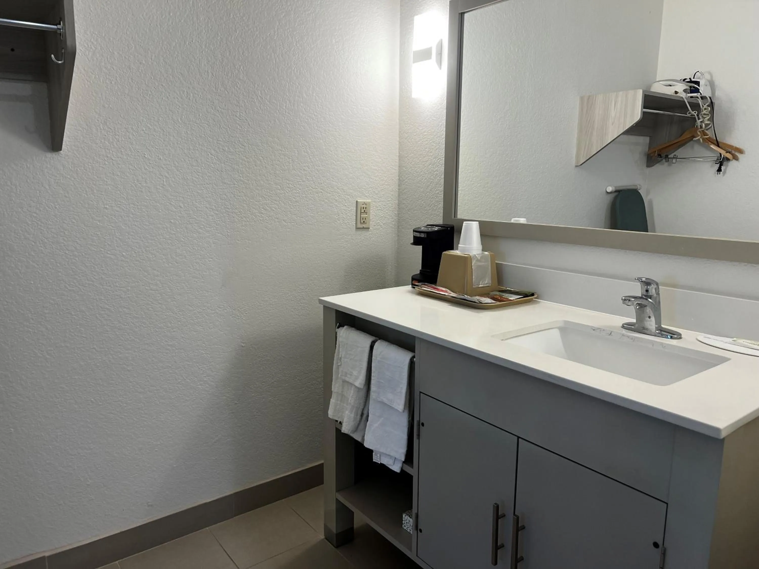 Bathroom in Super 8 by Wyndham Rosenberg TX