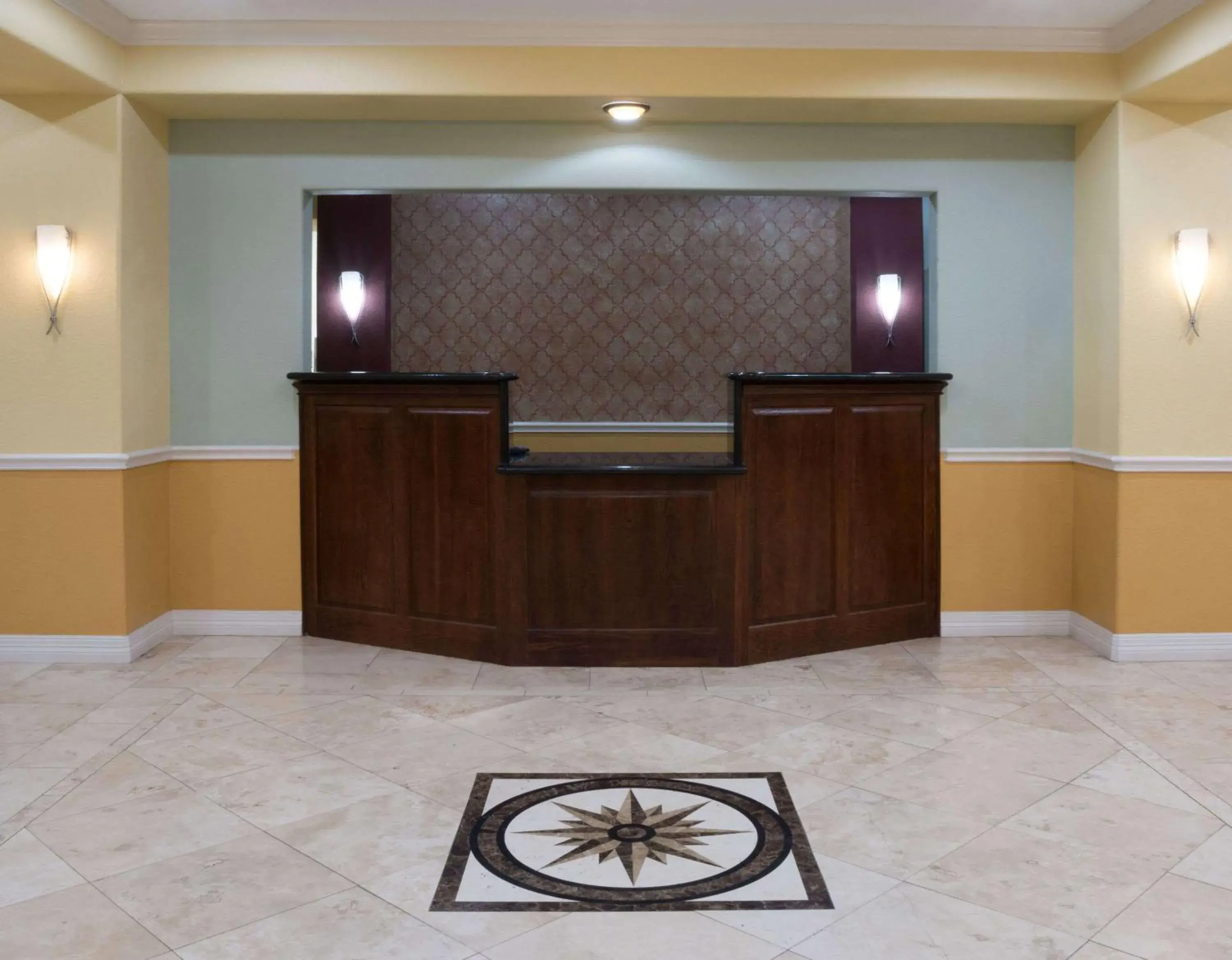 Lobby or reception in Super 8 by Wyndham Rosenberg TX Lobby or reception in Super 8 by Wyndham Rosenberg TX