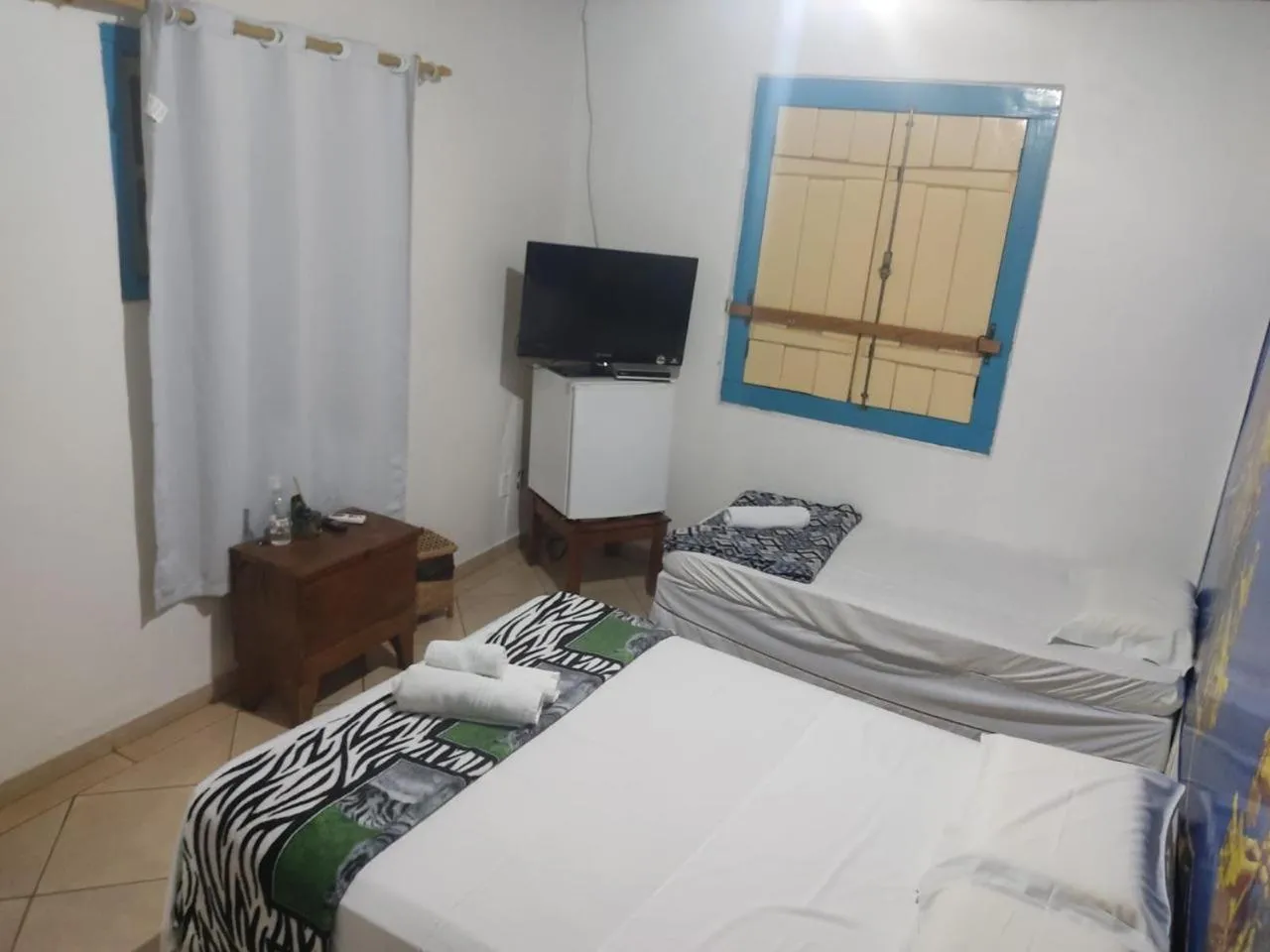 Bed in Pousada Colonial
