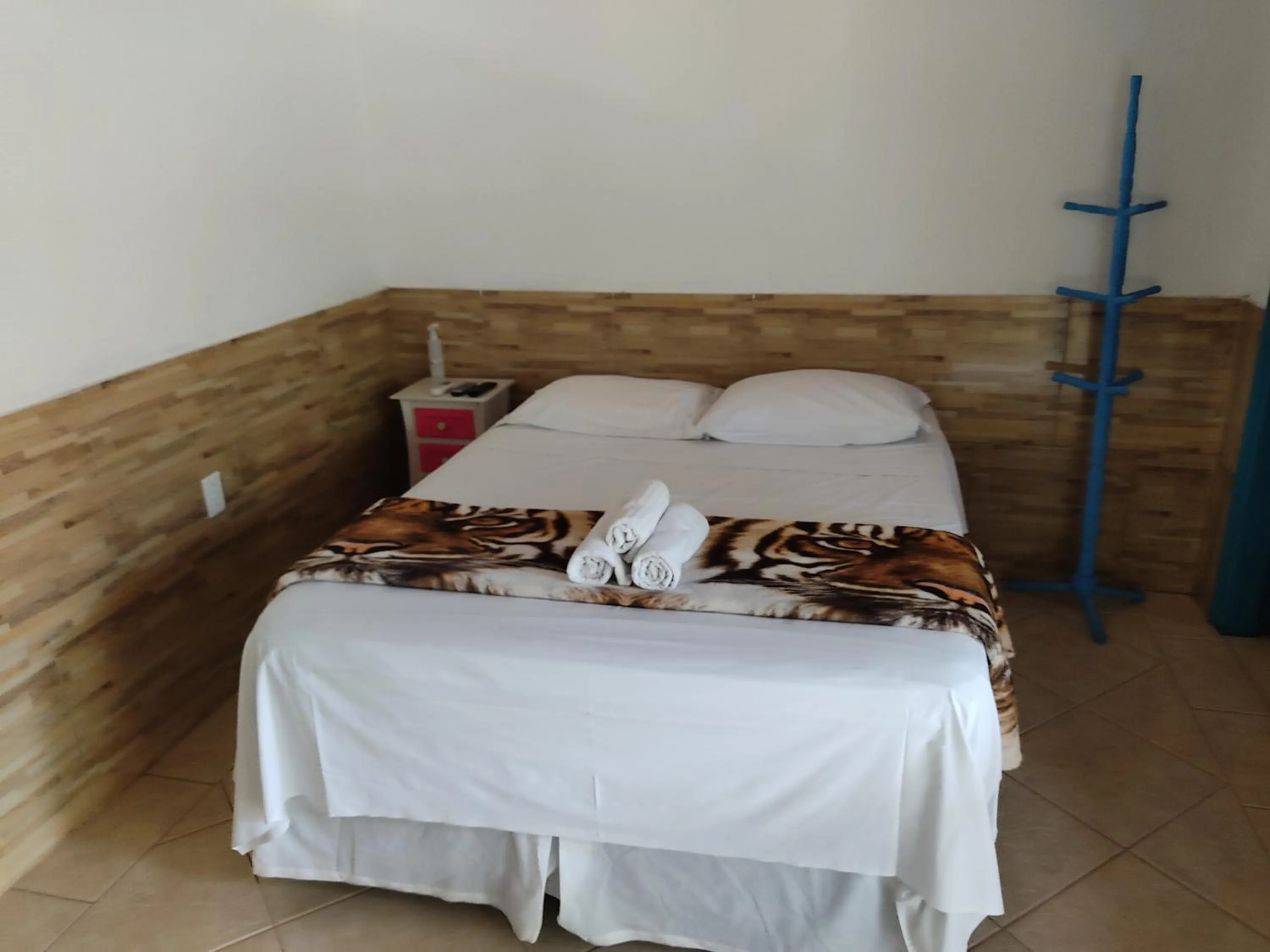 Bed in Pousada Colonial