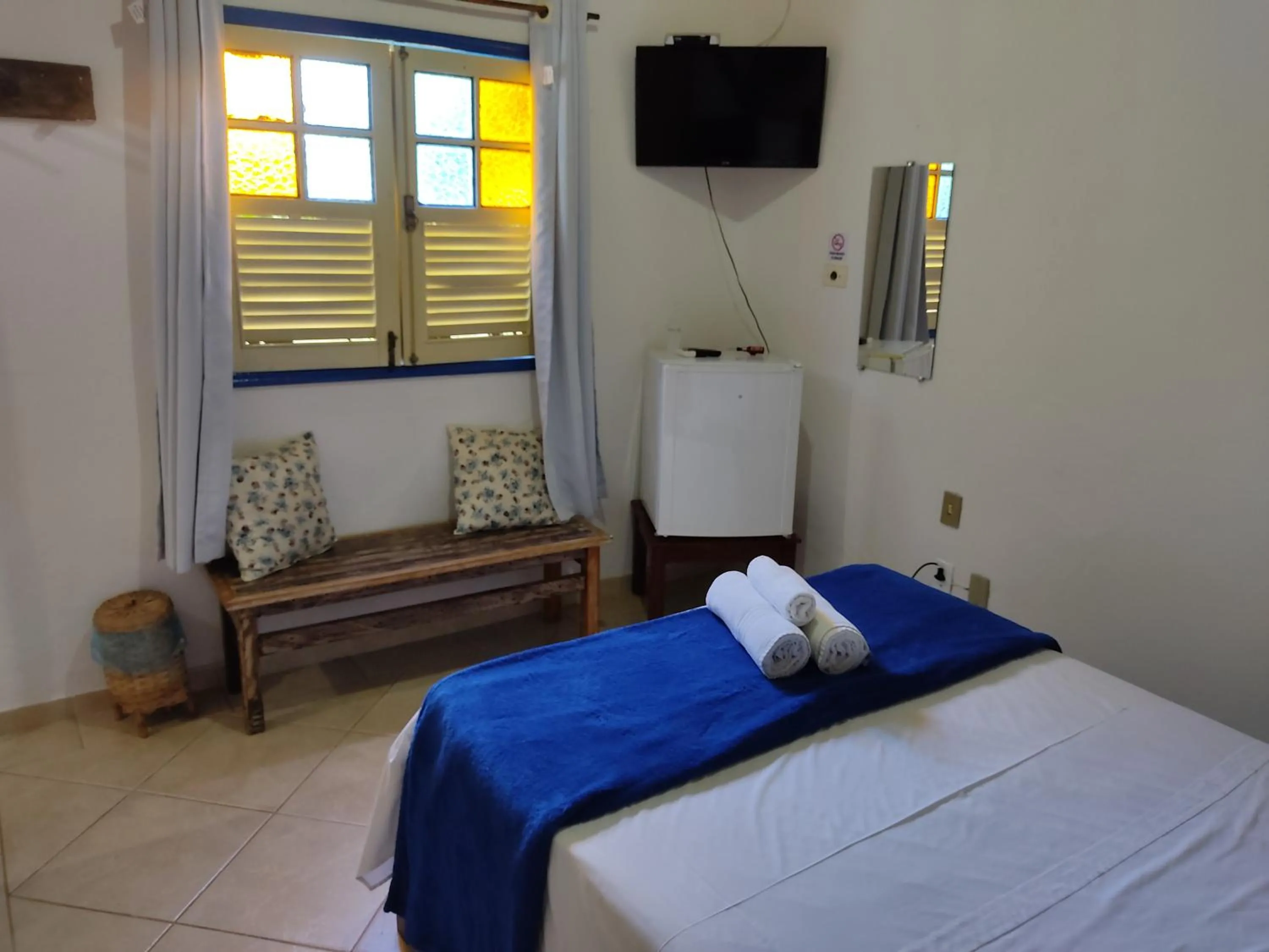Bed in Pousada Colonial