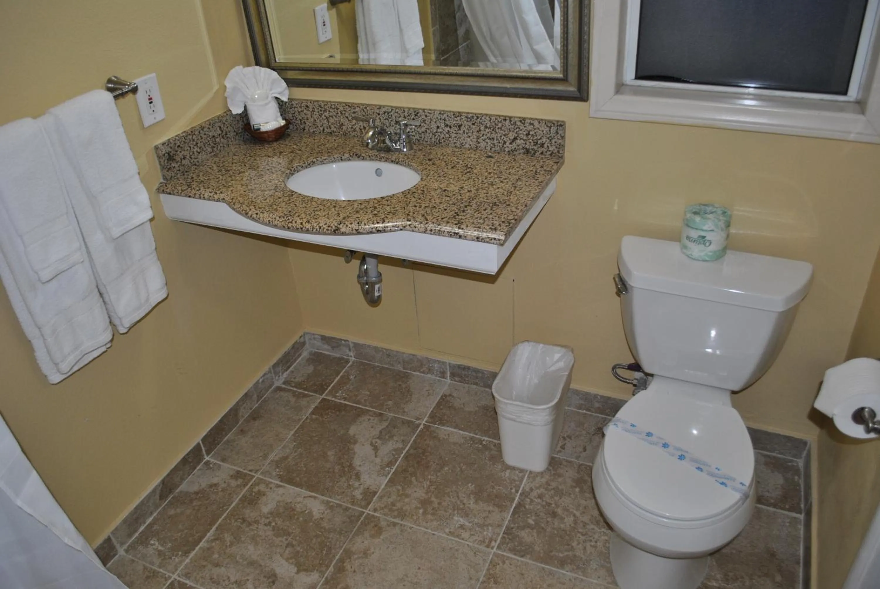 Bathroom in Oasis Inn and Suites