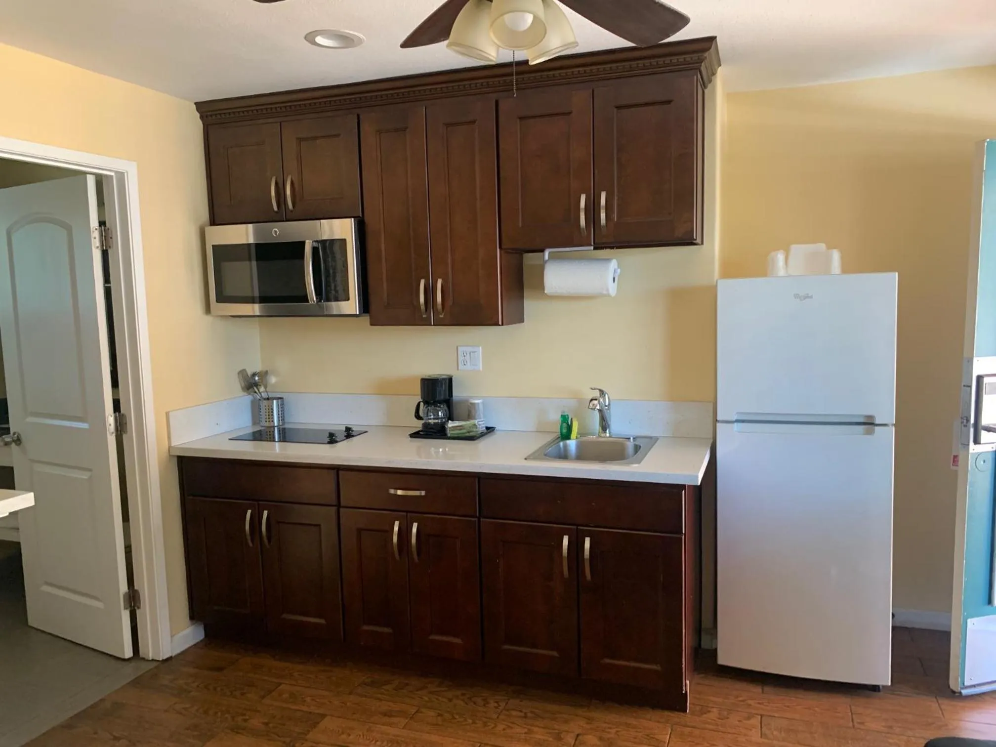 Kitchen or kitchenette in Oasis Inn and Suites