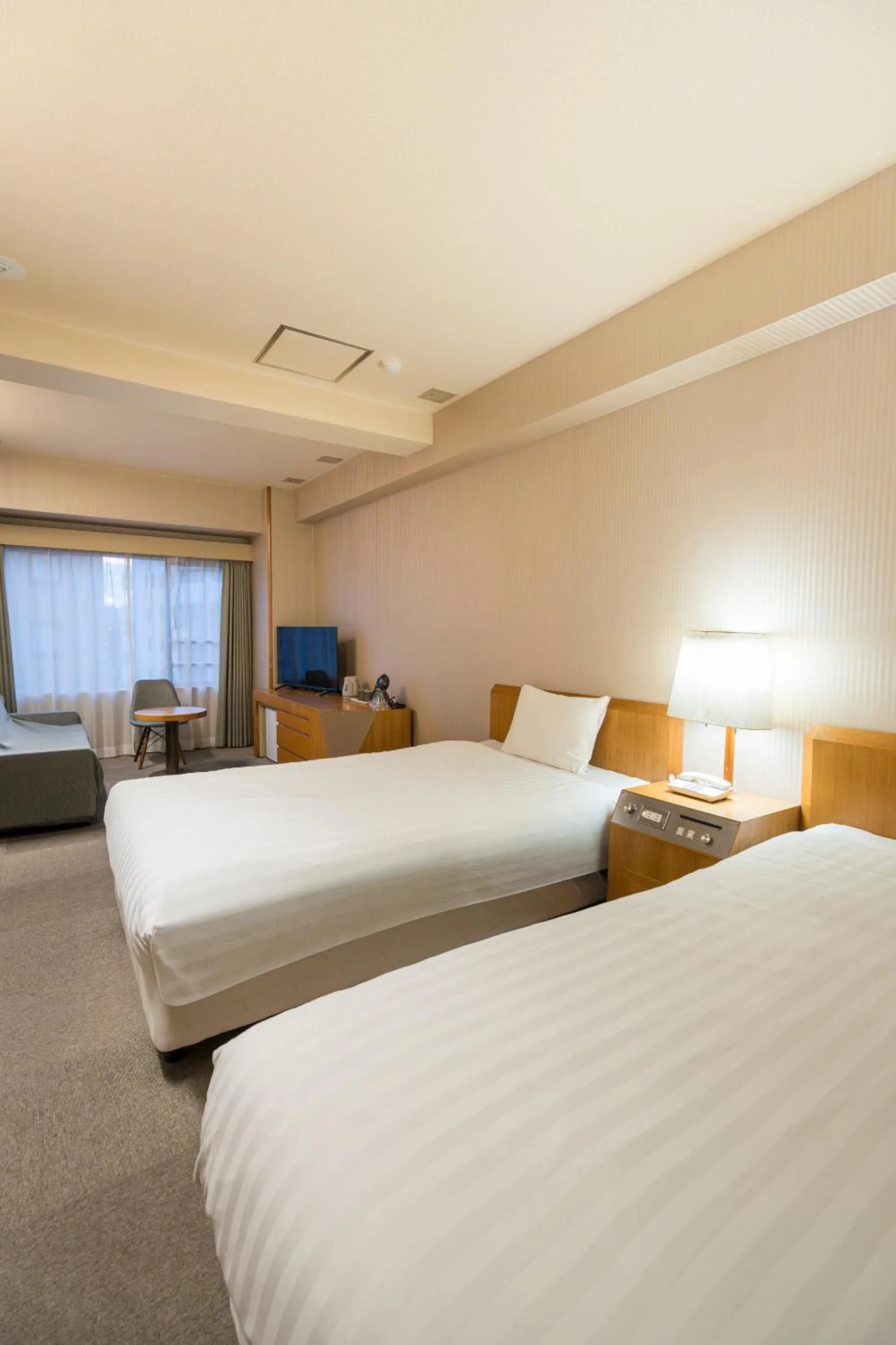 Bed in Court Hotel Fukuoka Tenjin