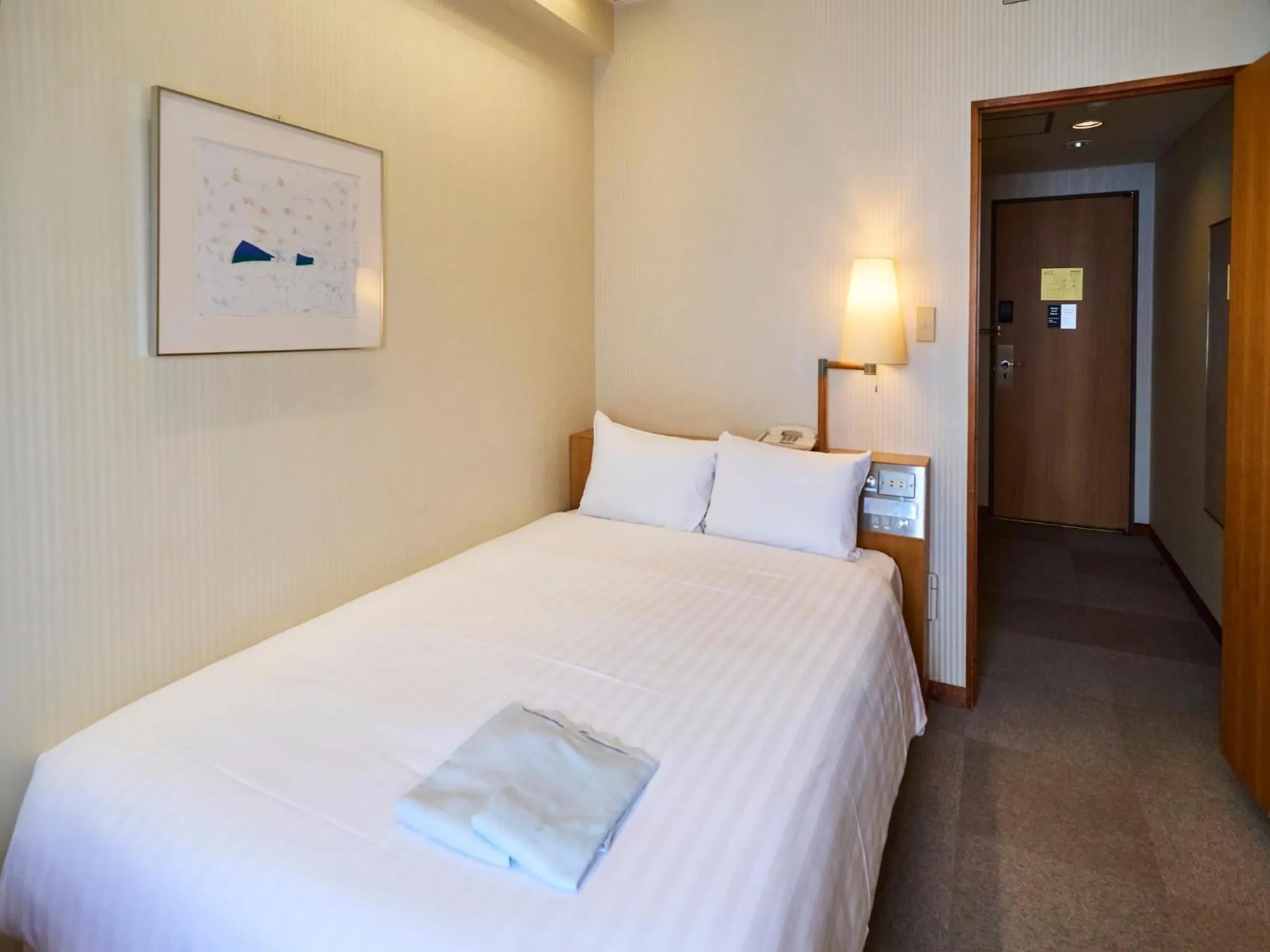 Bed in Court Hotel Fukuoka Tenjin