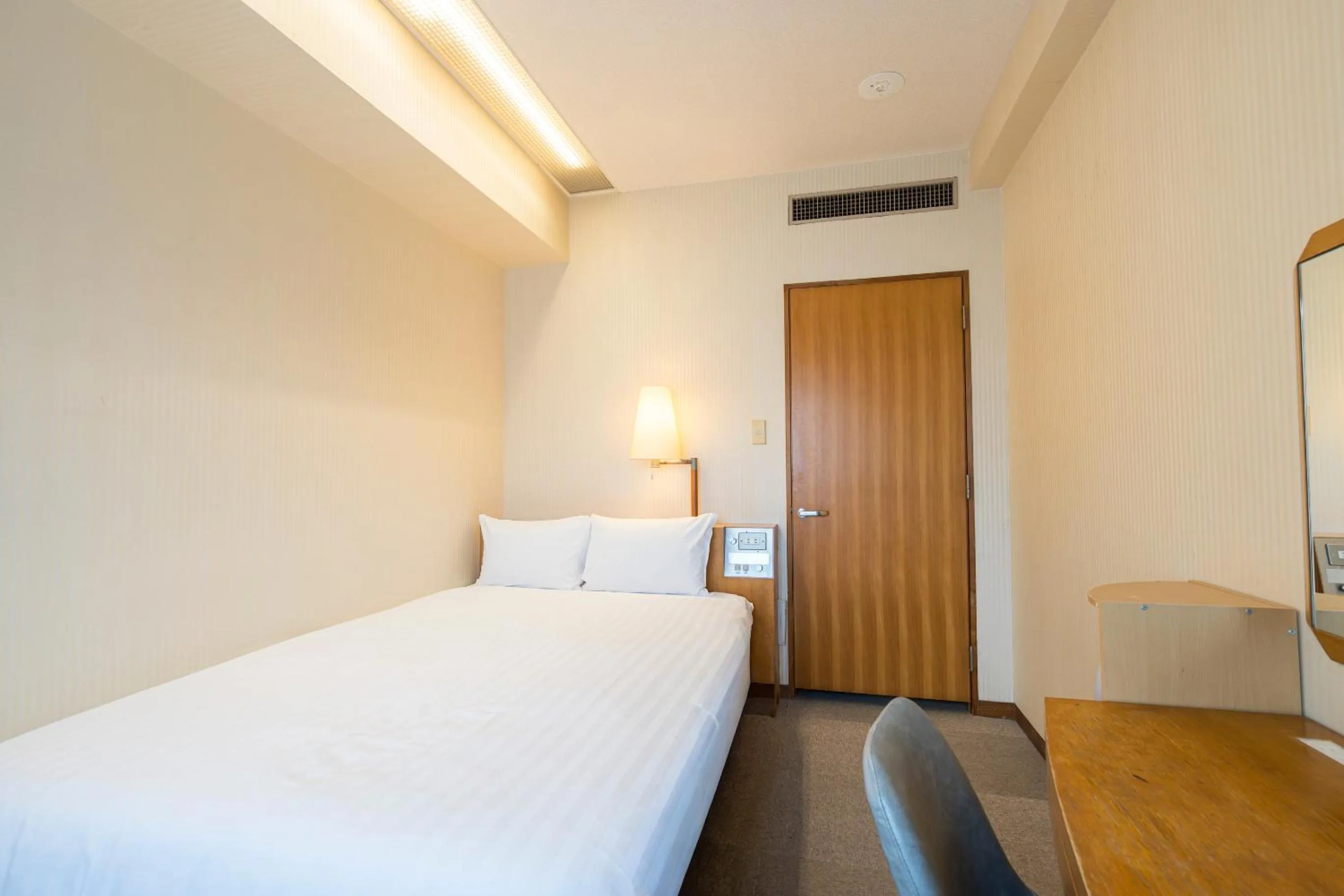 Bed in Court Hotel Fukuoka Tenjin