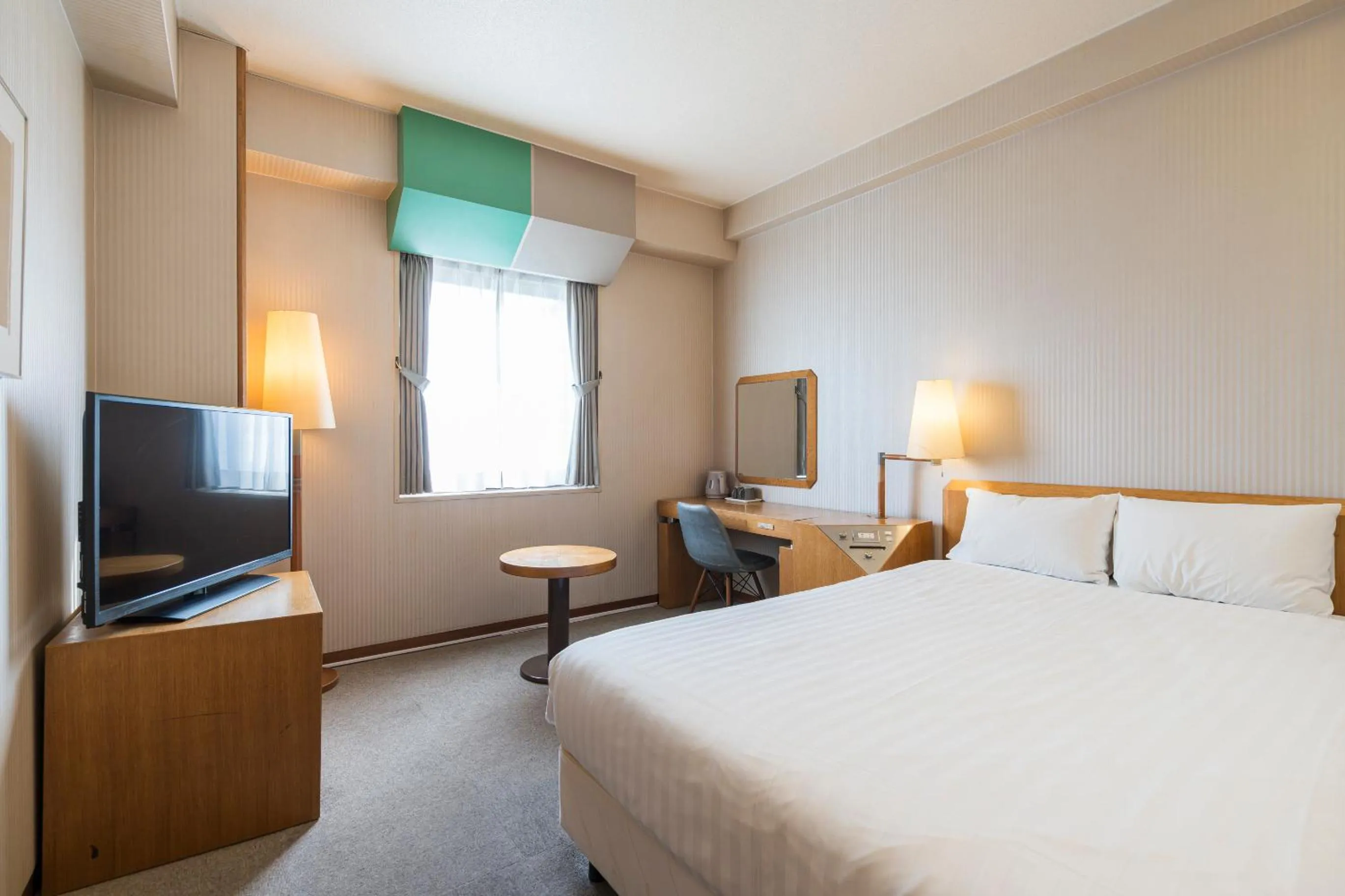 Bed in Court Hotel Fukuoka Tenjin