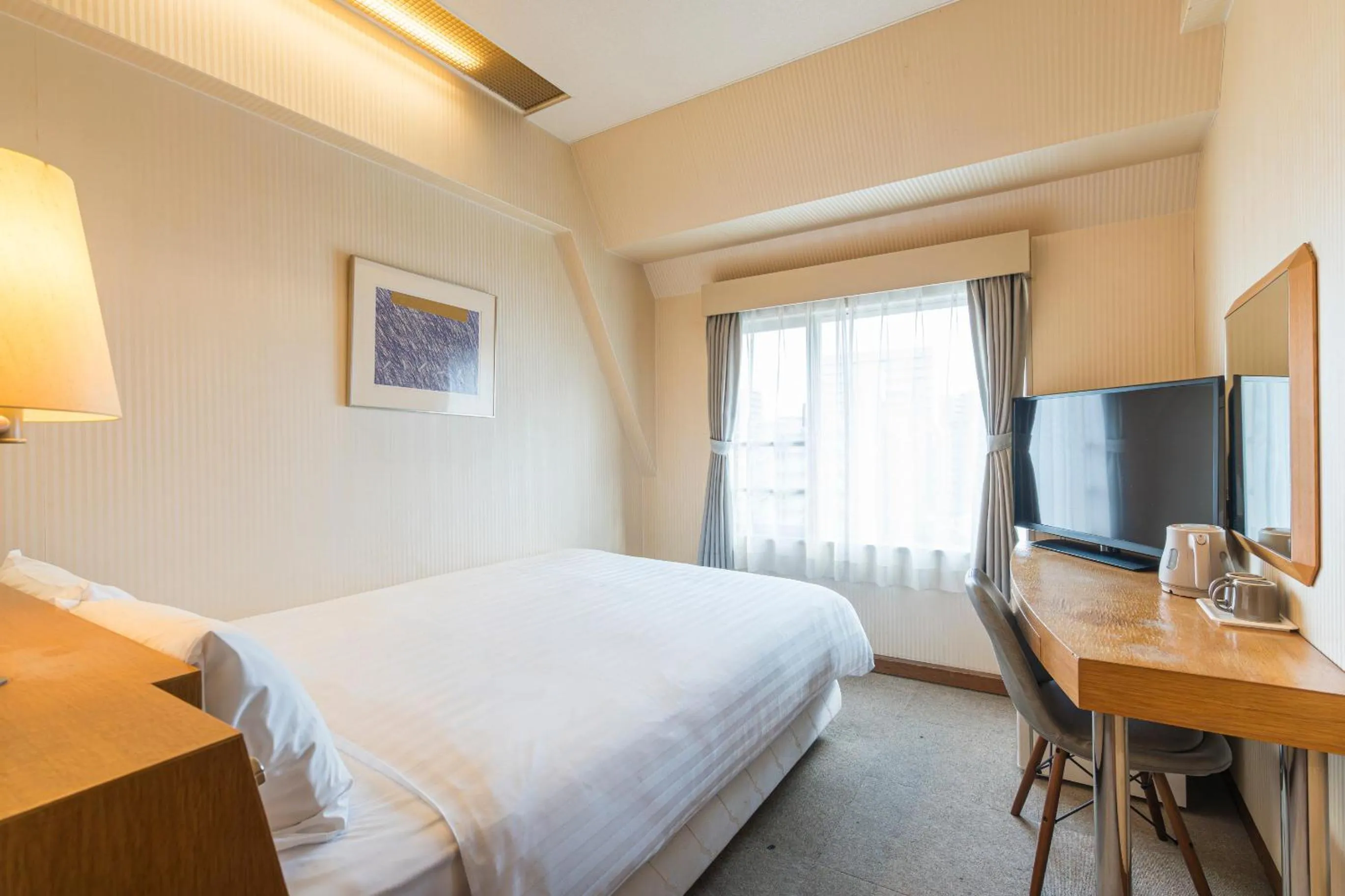 Bed in Court Hotel Fukuoka Tenjin