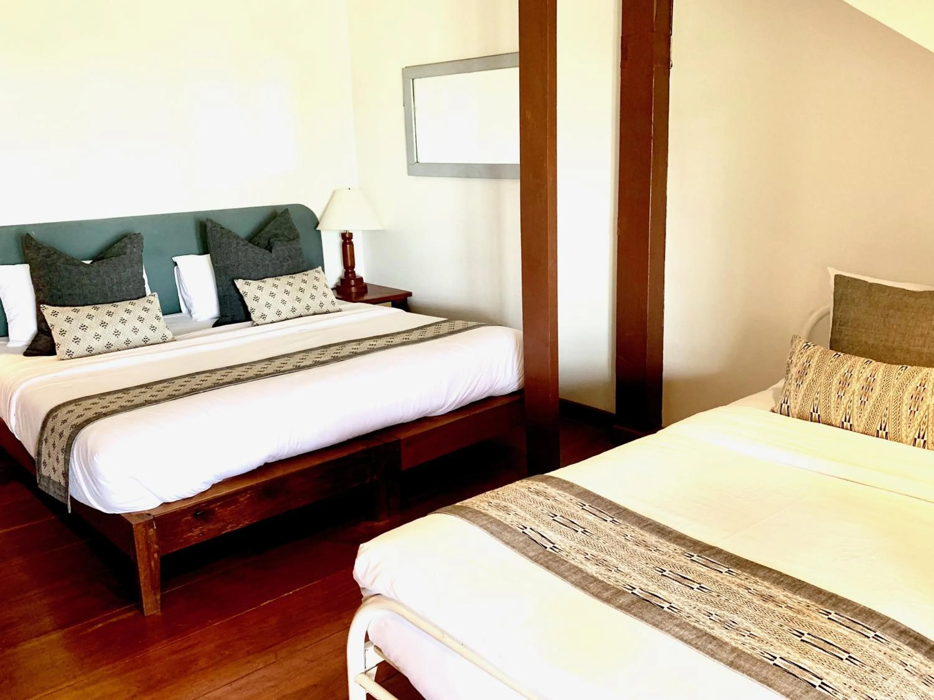 Bed in Riverhouse-The Teak House